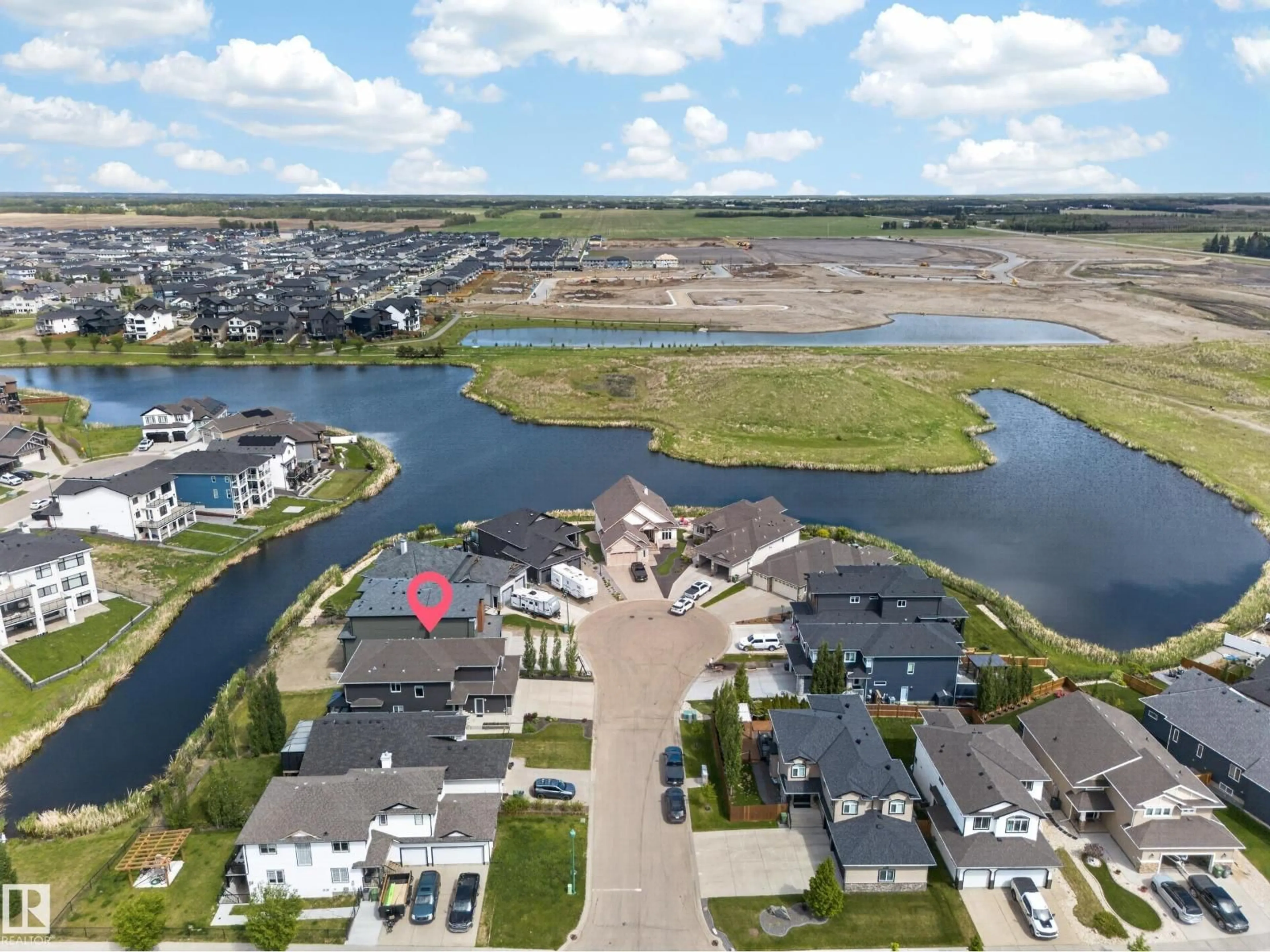 A pic from outside/outdoor area/front of a property/back of a property/a pic from drone, water/lake/river/ocean view for 92 LAKELAND CR, Beaumont Alberta T5X0B5