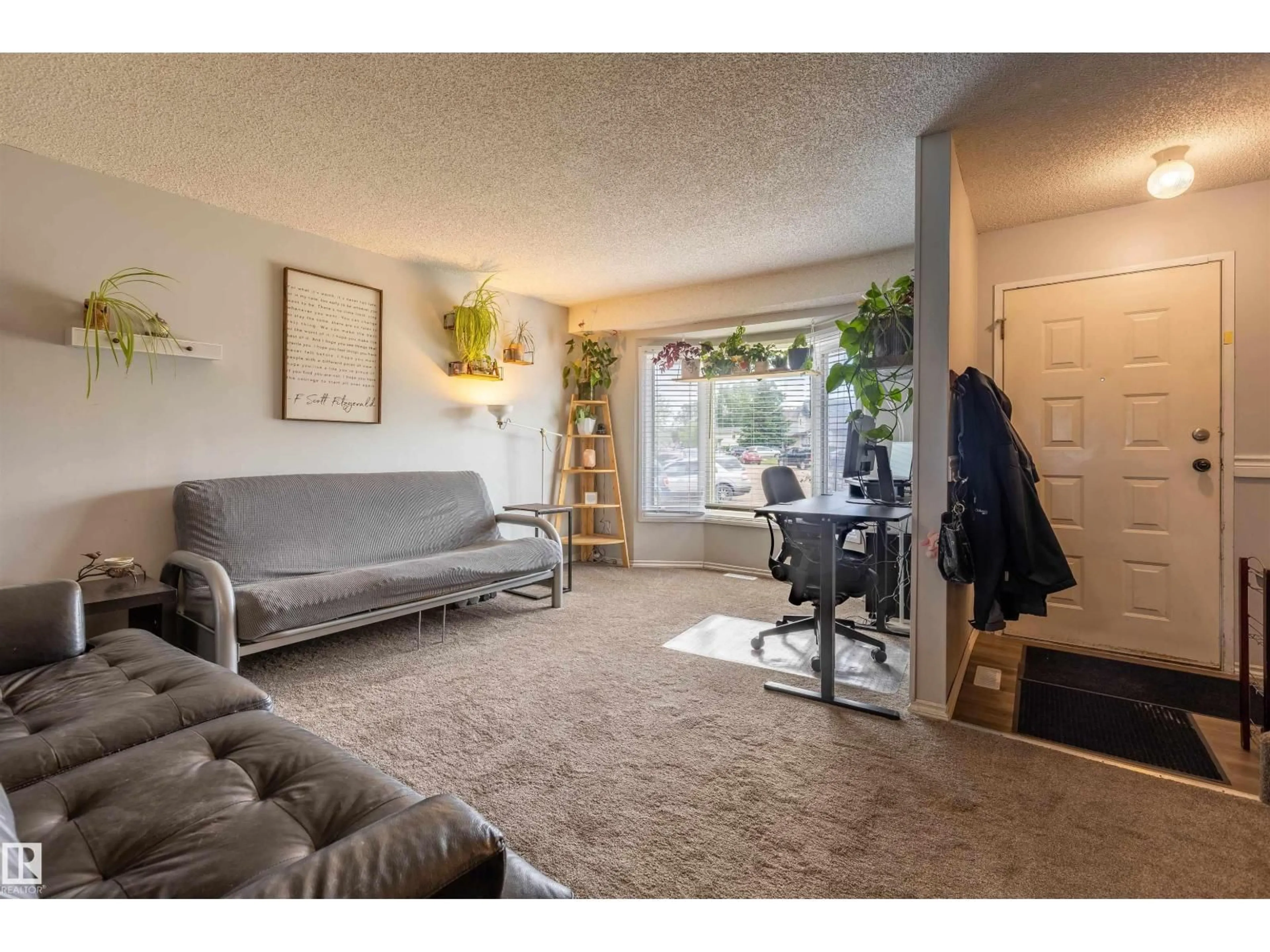 Living room with furniture, carpet floor for 10722 98 AV, Morinville Alberta T8R1E5