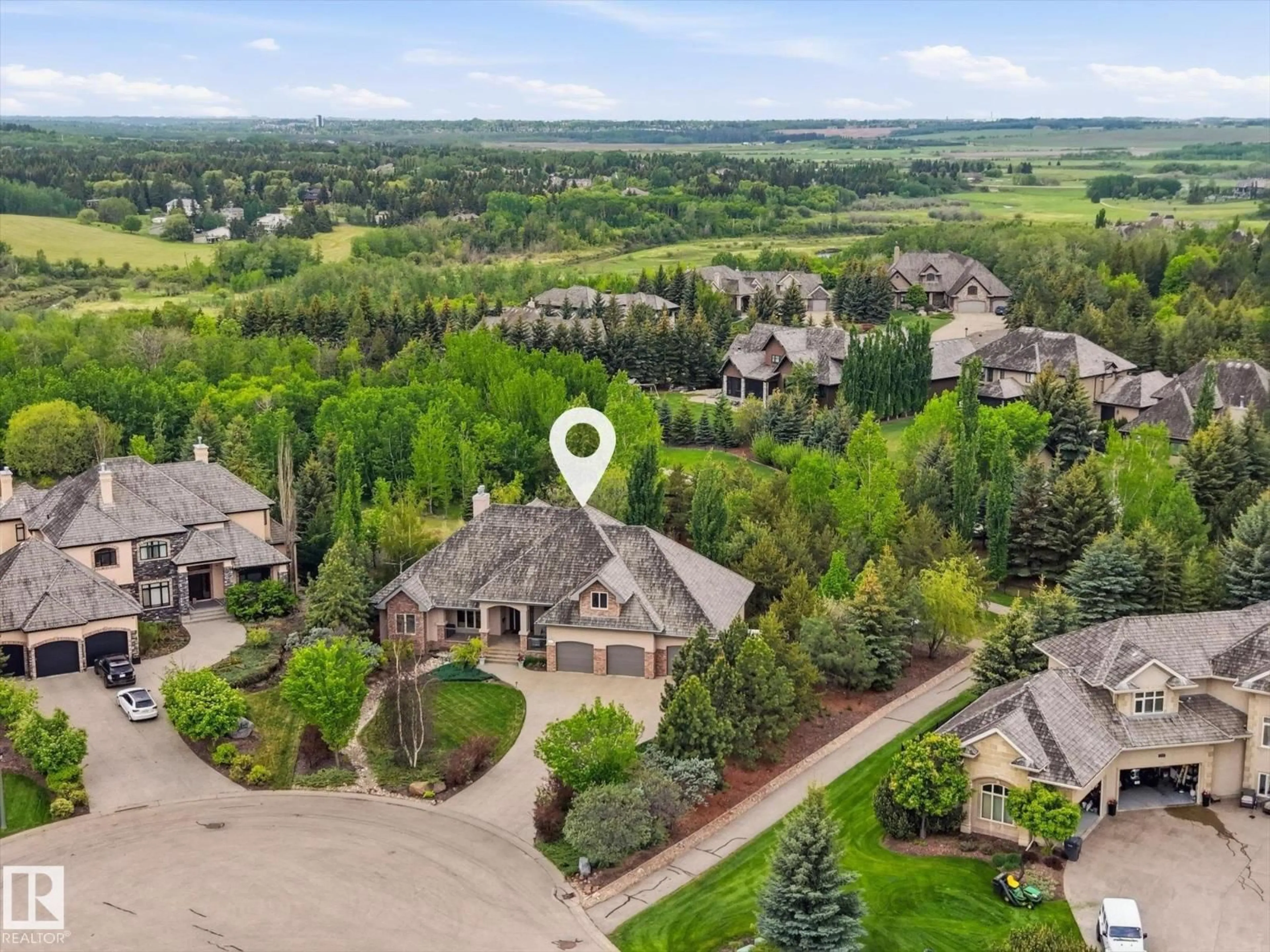 A pic from outside/outdoor area/front of a property/back of a property/a pic from drone, mountain view for 161 25015 TWP ROAD 544A, Rural Sturgeon County Alberta T8T0B9