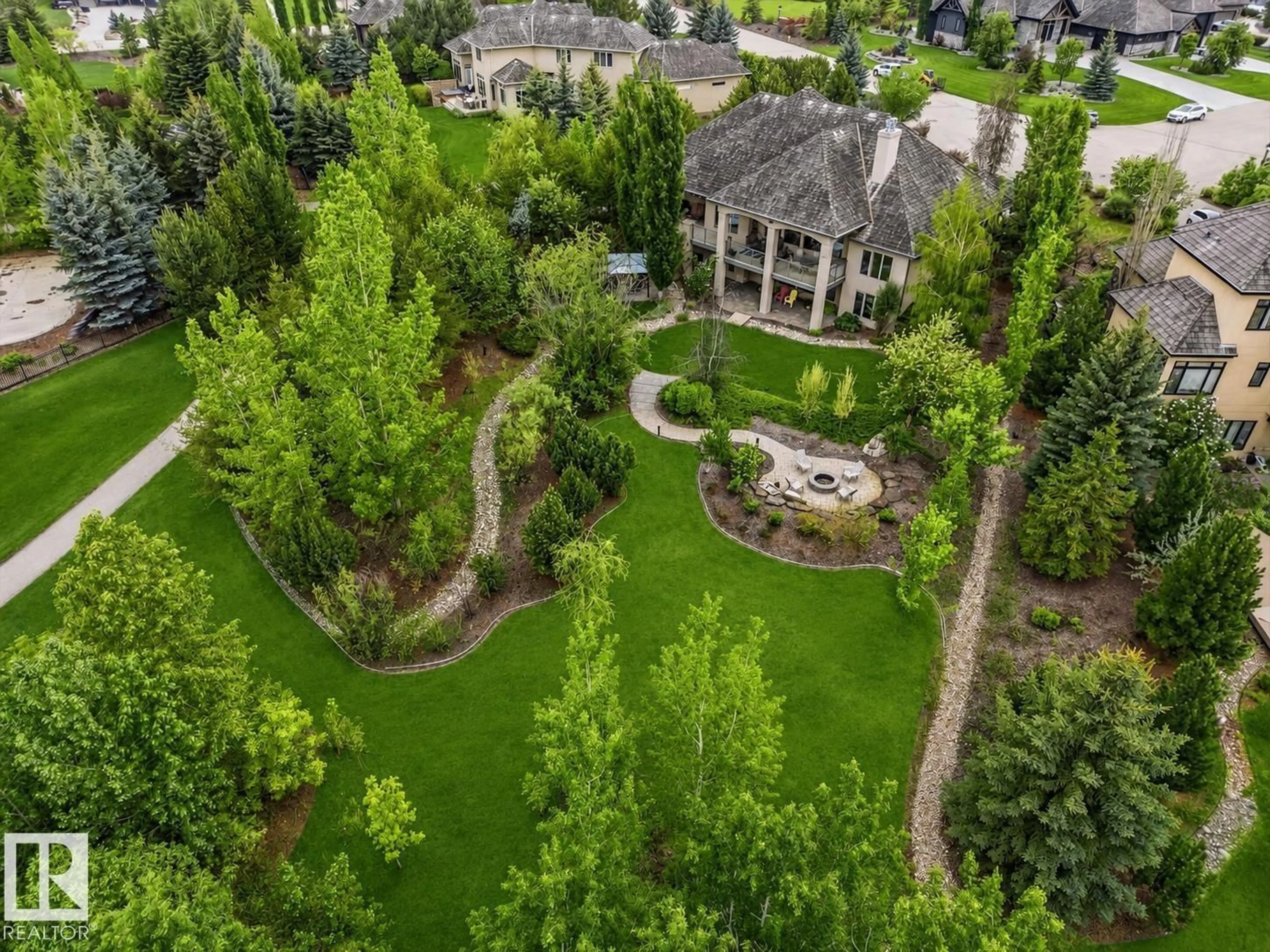 A pic from outside/outdoor area/front of a property/back of a property/a pic from drone, forest/trees view for 161 25015 TWP ROAD 544A, Rural Sturgeon County Alberta T8T0B9