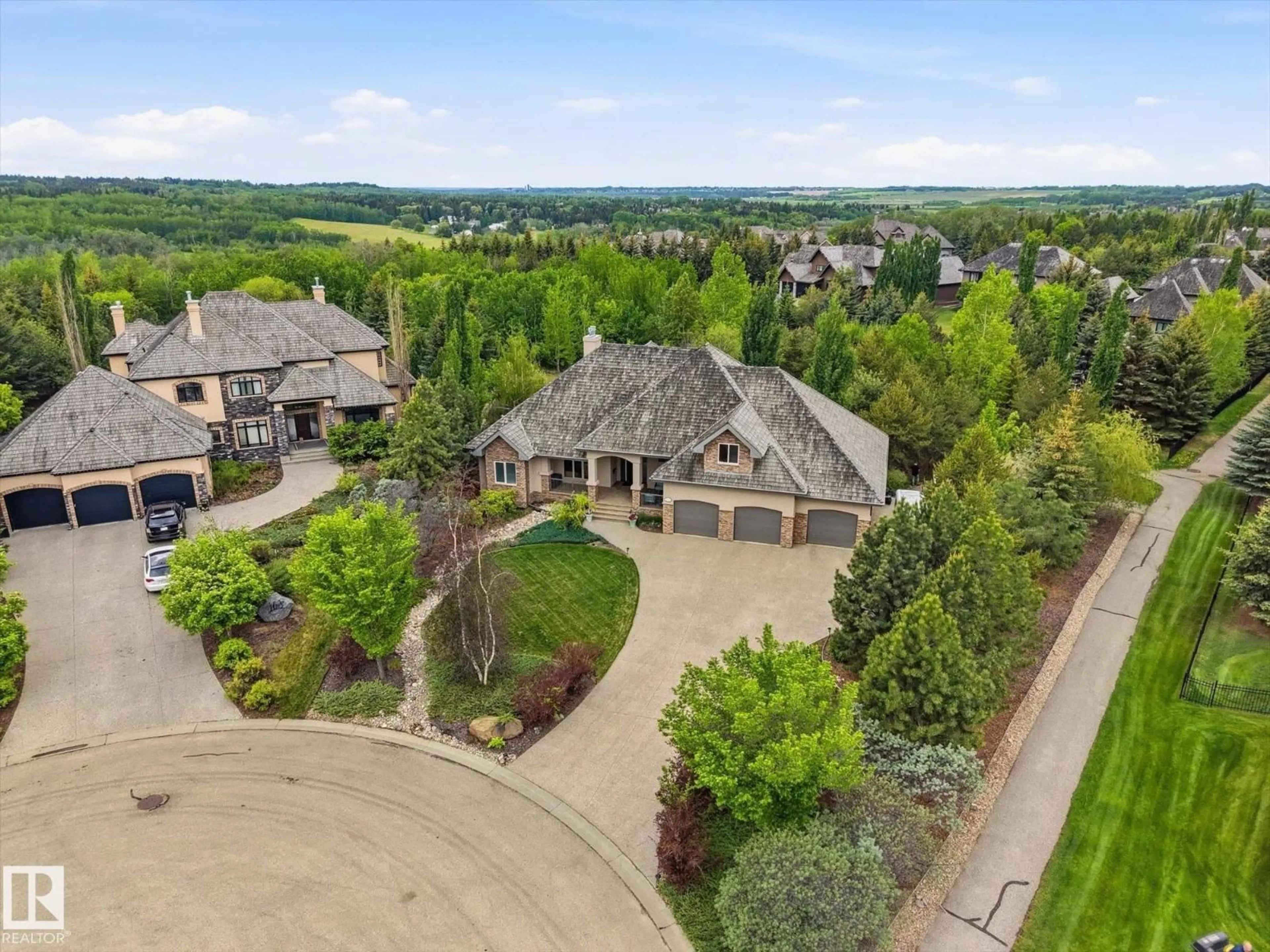 A pic from outside/outdoor area/front of a property/back of a property/a pic from drone, mountain view for 161 25015 TWP ROAD 544A, Rural Sturgeon County Alberta T8T0B9