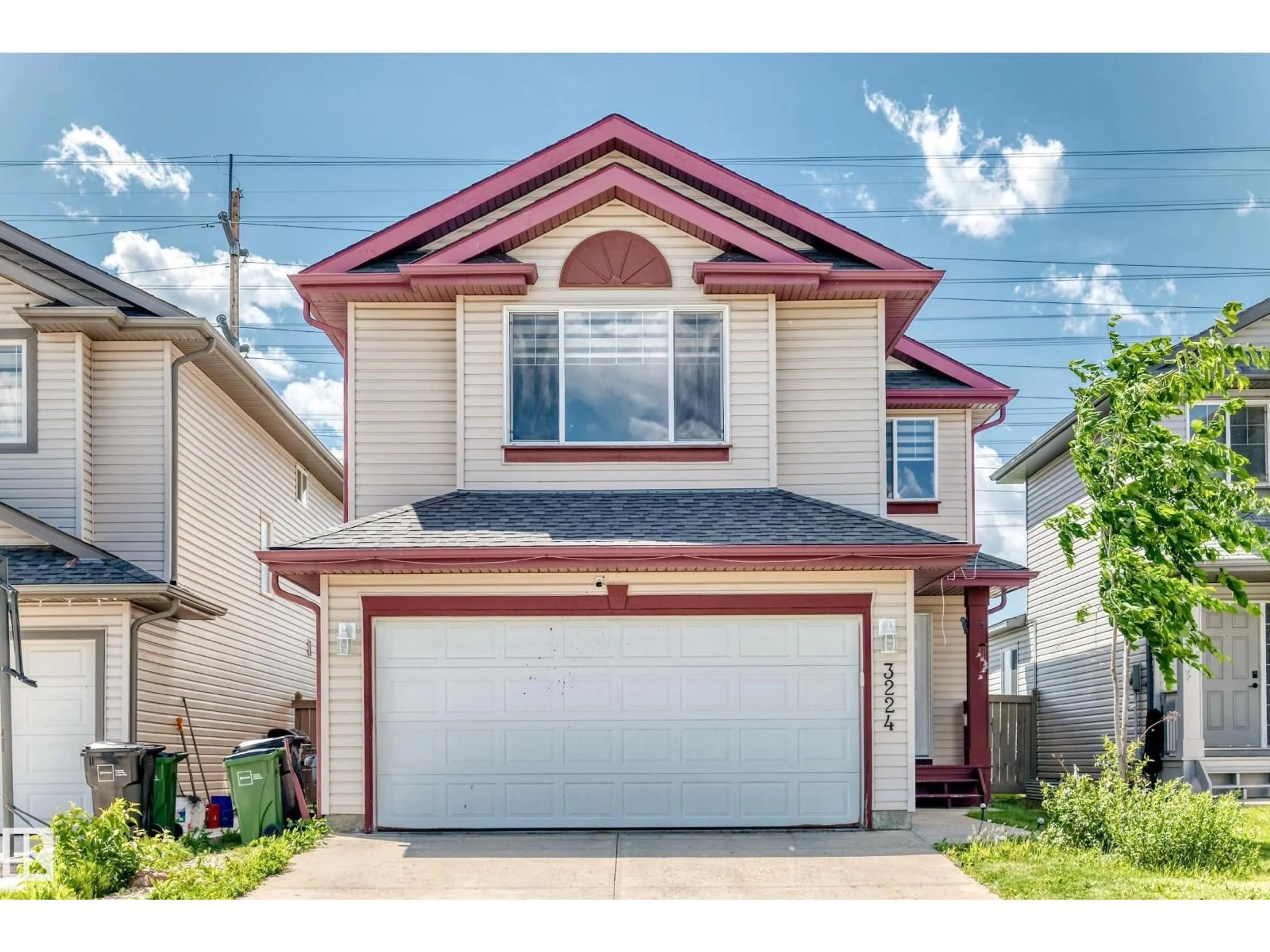 Home with vinyl exterior material, street for 3224 26 ST, Edmonton Alberta T6T1Z3