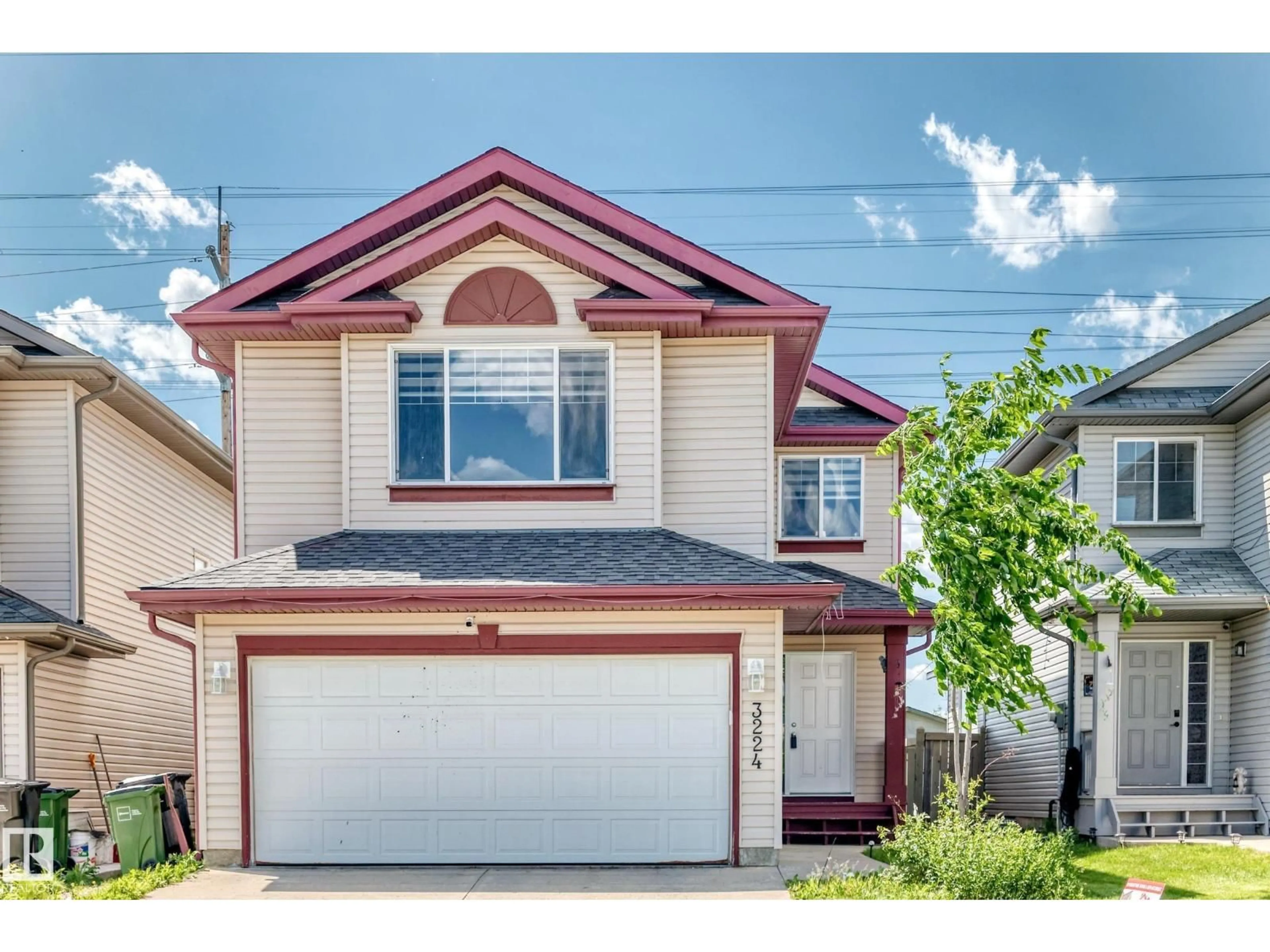 Home with vinyl exterior material, street for 3224 26 ST, Edmonton Alberta T6T1Z3