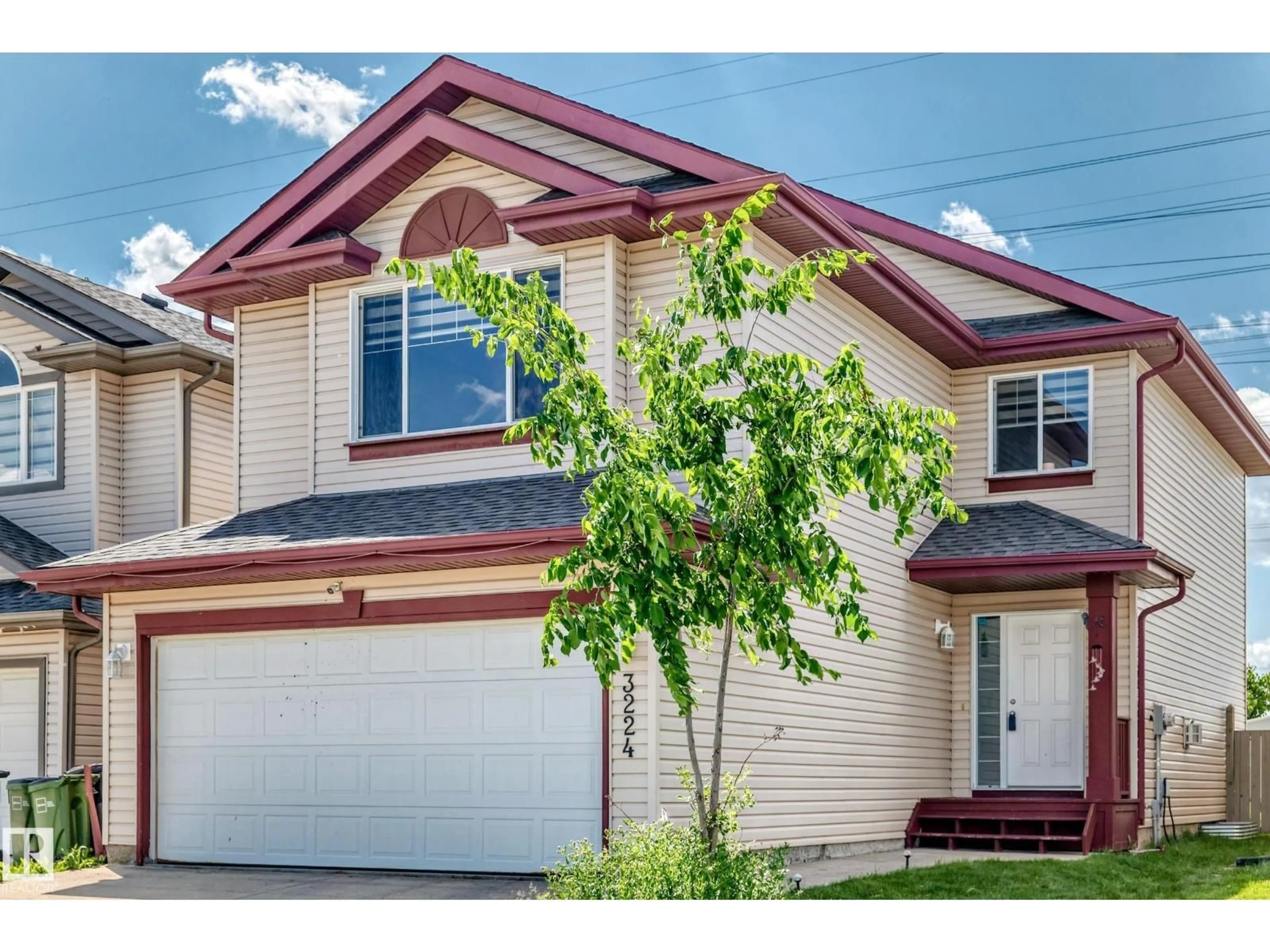 Home with vinyl exterior material, street for 3224 26 ST, Edmonton Alberta T6T1Z3