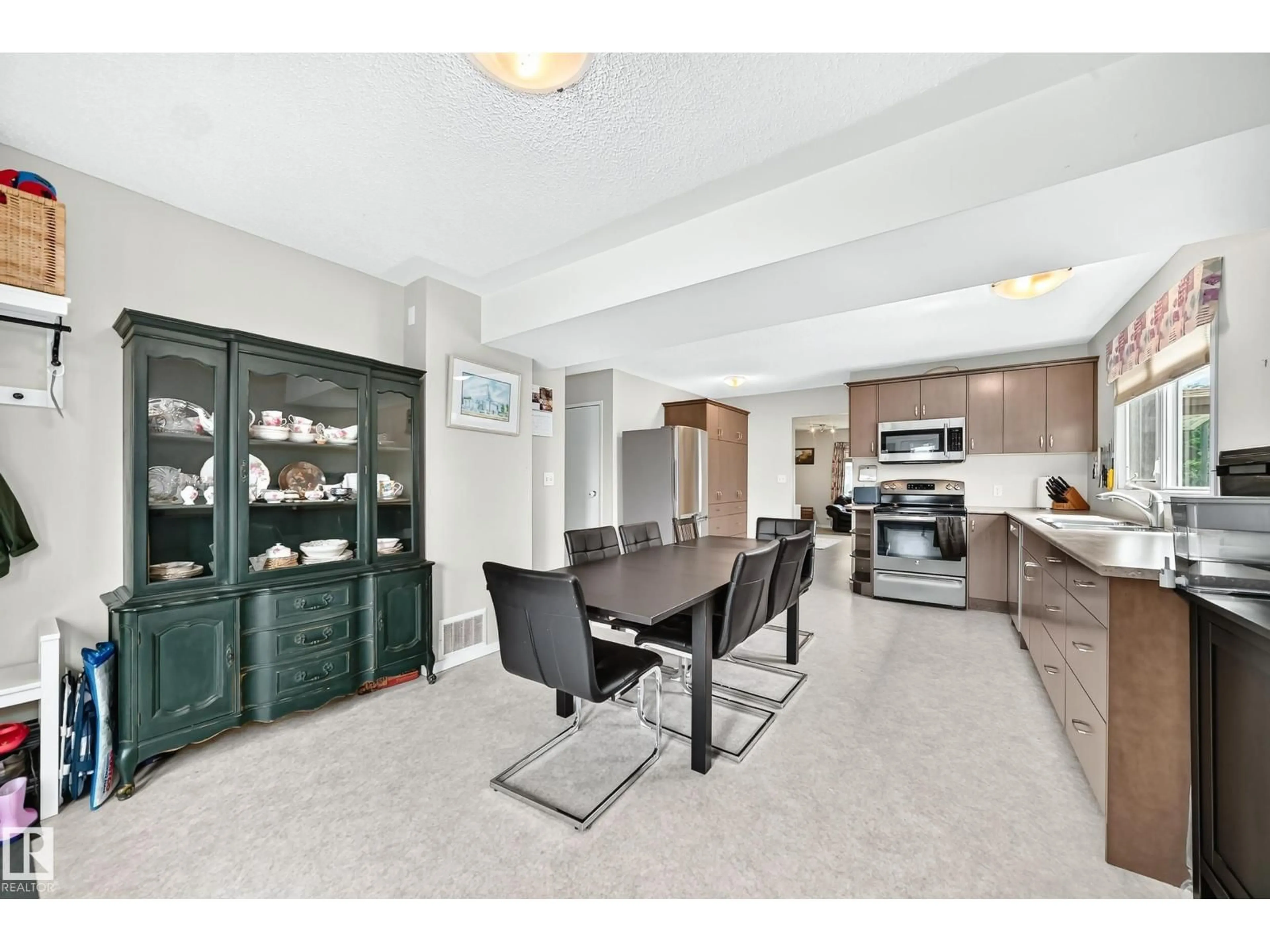 Open concept kitchen, ceramic/tile floor for 10210 154 ST, Edmonton Alberta T5P2H4