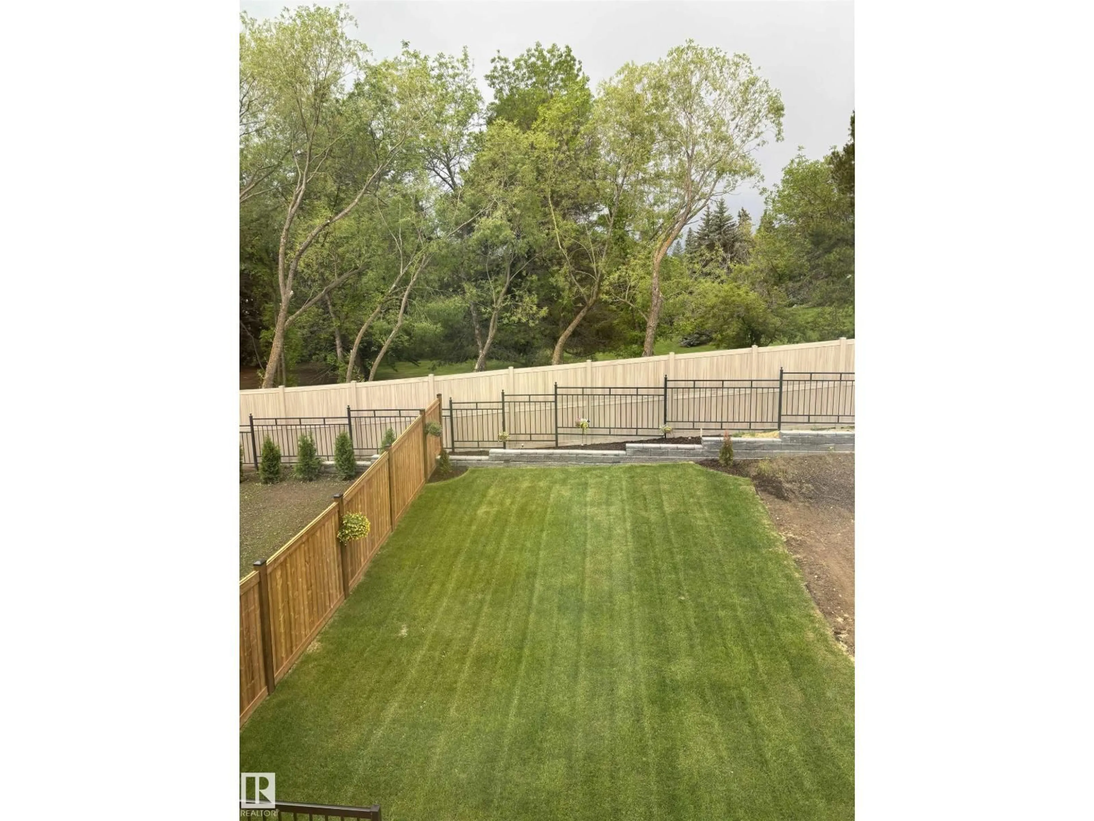 A pic from outside/outdoor area/front of a property/back of a property/a pic from drone, unknown for NW - 4104 208 ST, Edmonton Alberta T6M3E4