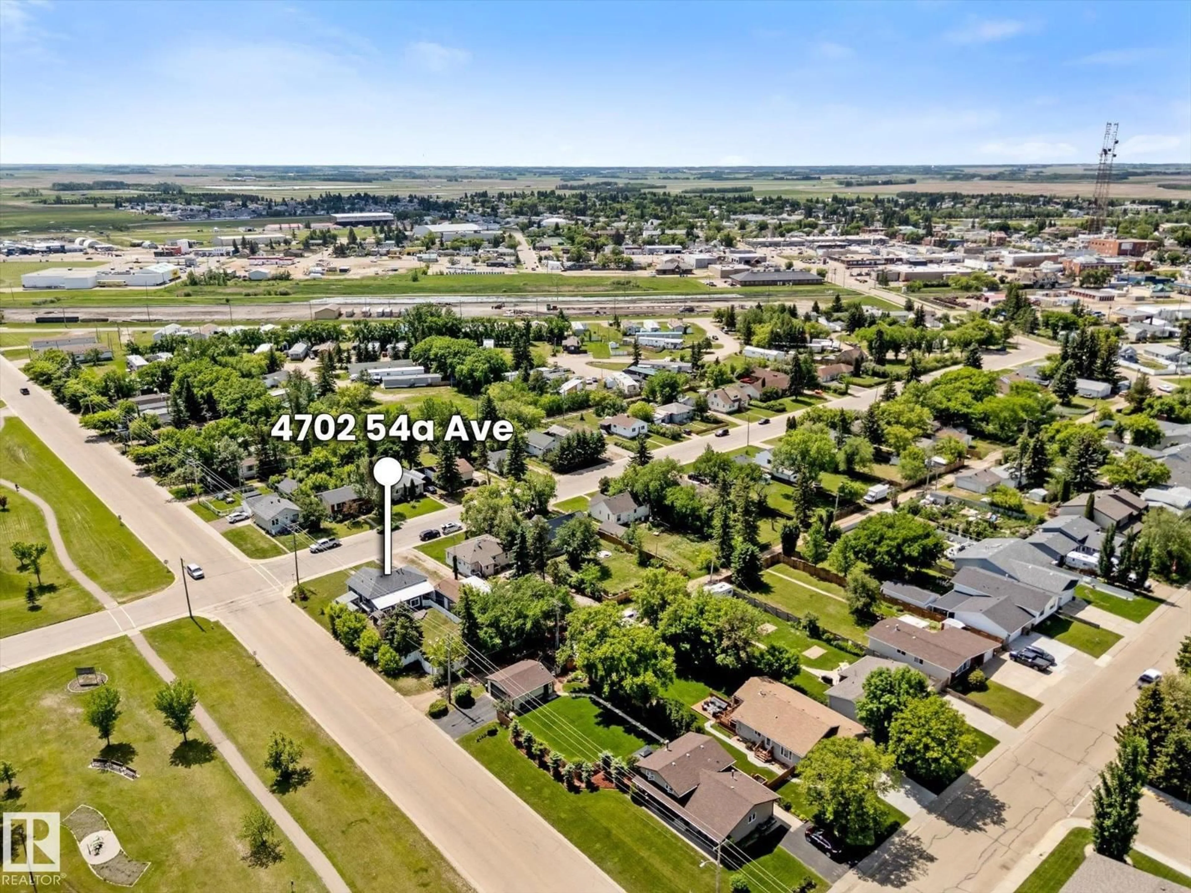 A pic from outside/outdoor area/front of a property/back of a property/a pic from drone, street for 4702 54 A AV, Vegreville Alberta T9C1G2
