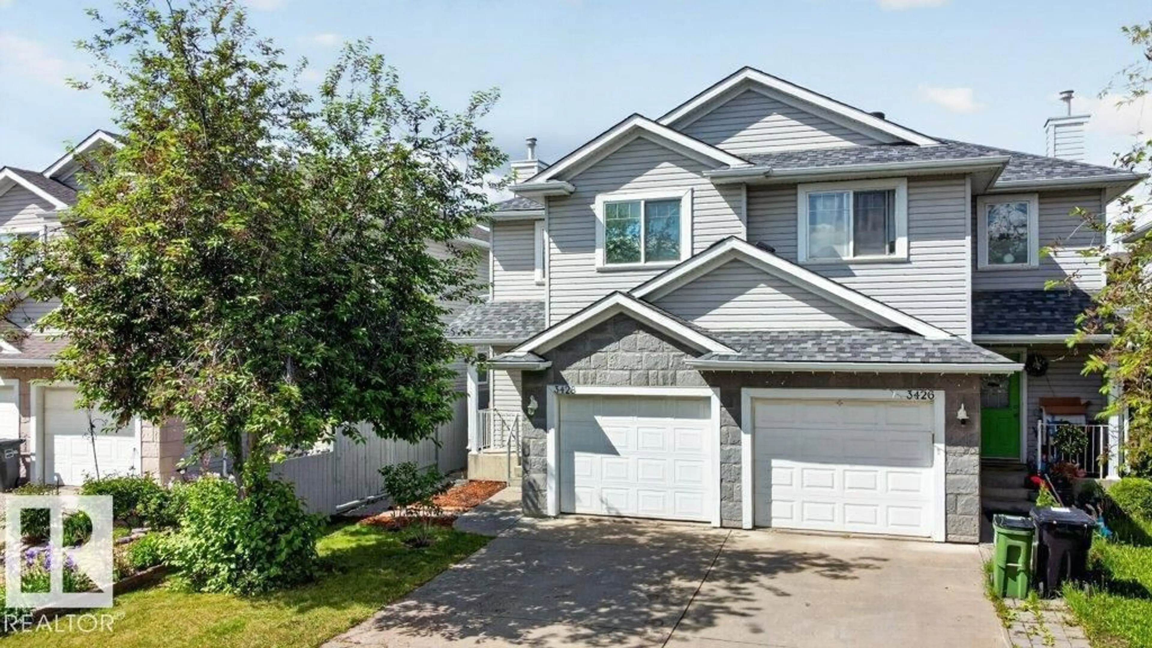 Home with vinyl exterior material, street for 3428 MCKAY LN, Edmonton Alberta T6W1L5