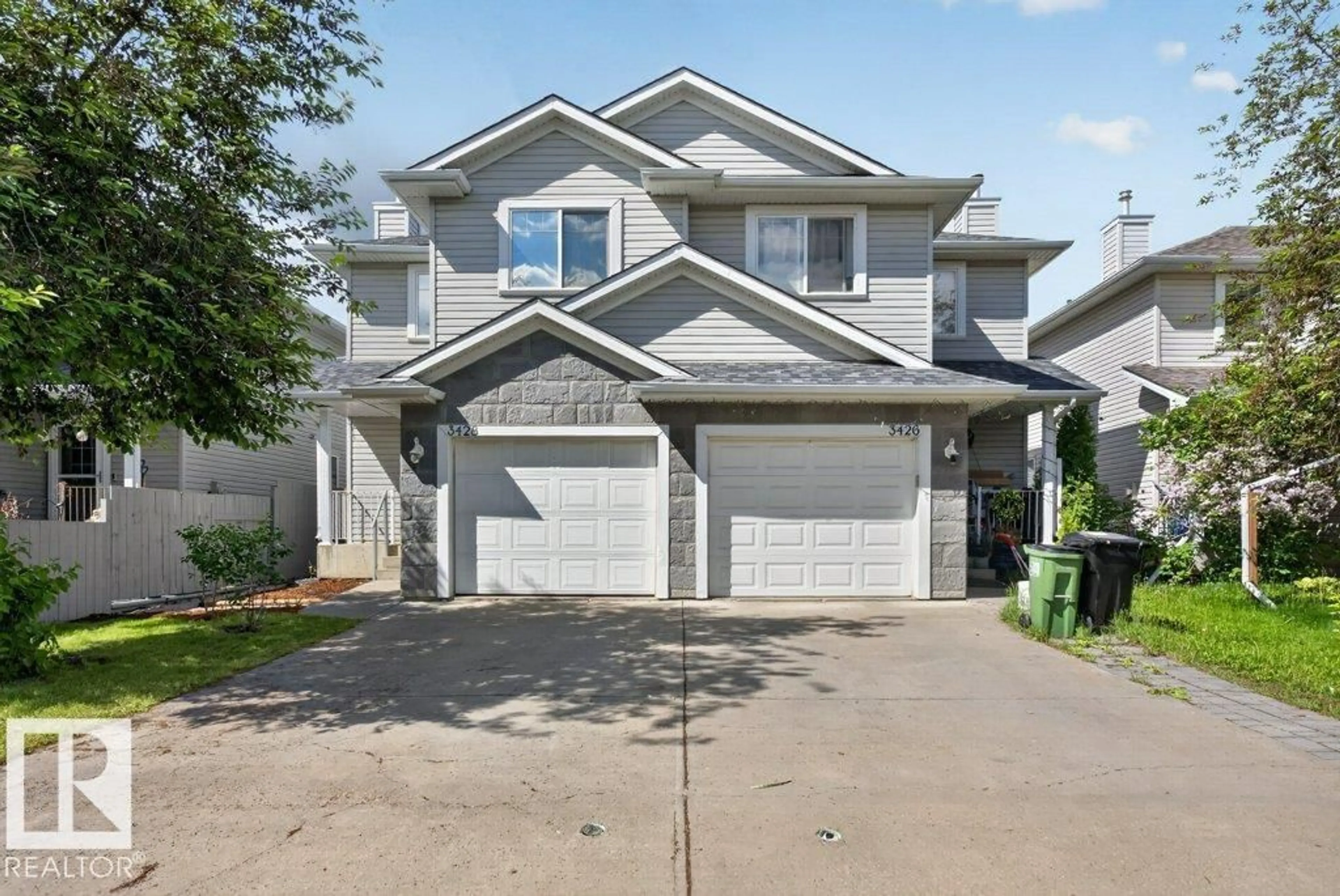 Home with vinyl exterior material, street for 3428 MCKAY LN, Edmonton Alberta T6W1L5