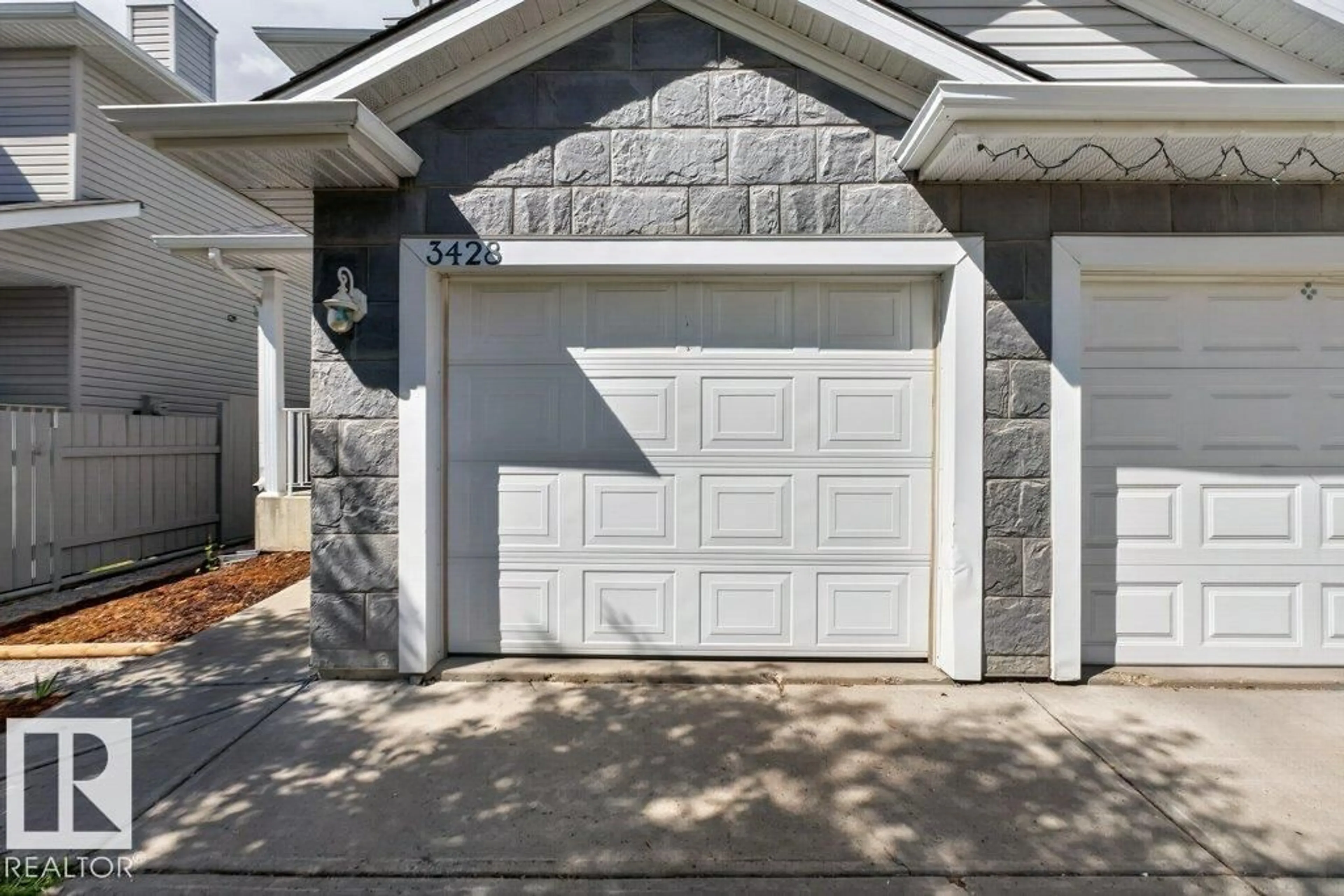 Home with vinyl exterior material, street for 3428 MCKAY LN, Edmonton Alberta T6W1L5