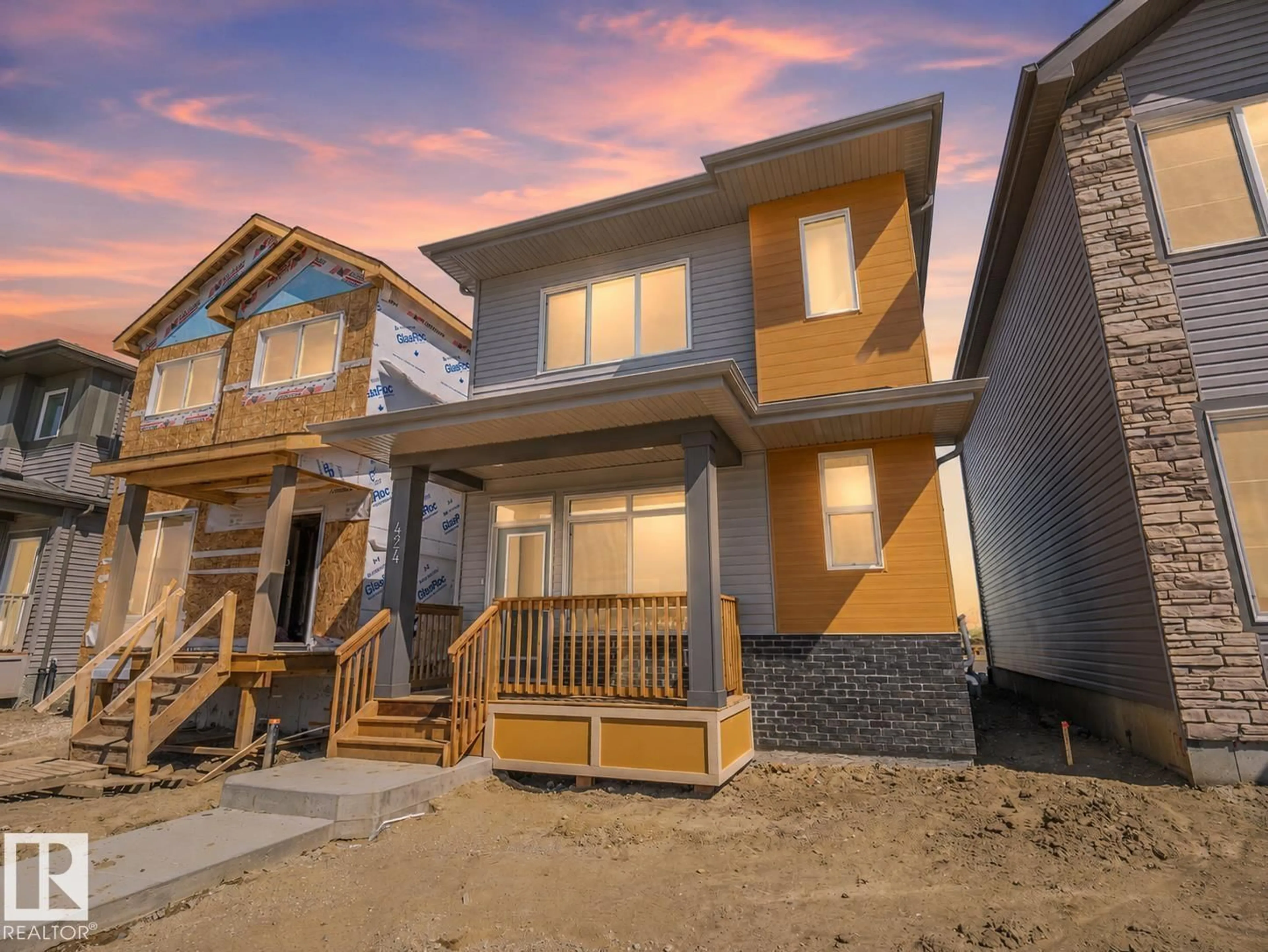 Home with vinyl exterior material, street for 424 176 AV, Edmonton Alberta T5Y4K6