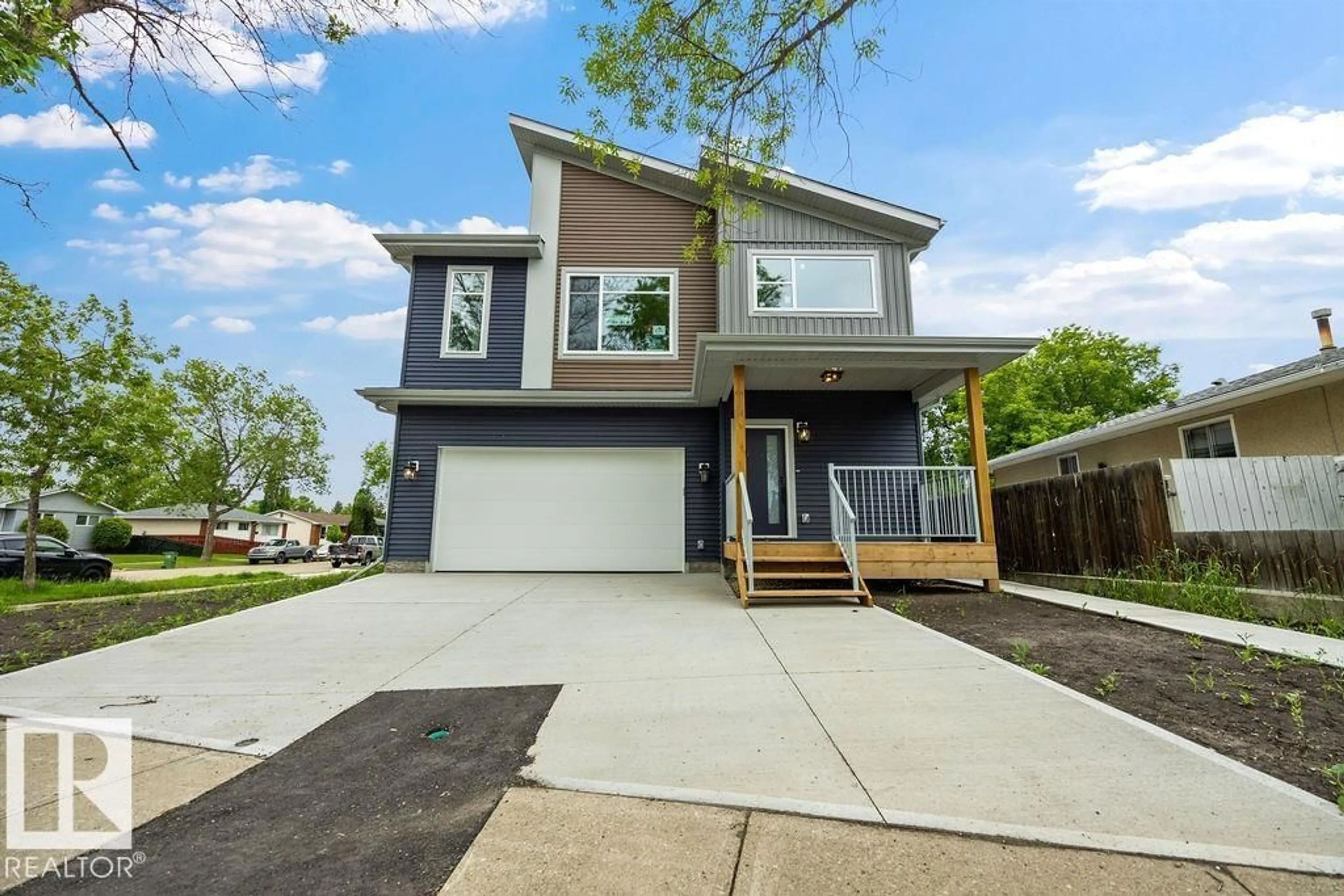 Home with vinyl exterior material, street for NW - 15004 62 ST, Edmonton Alberta T5A1W8