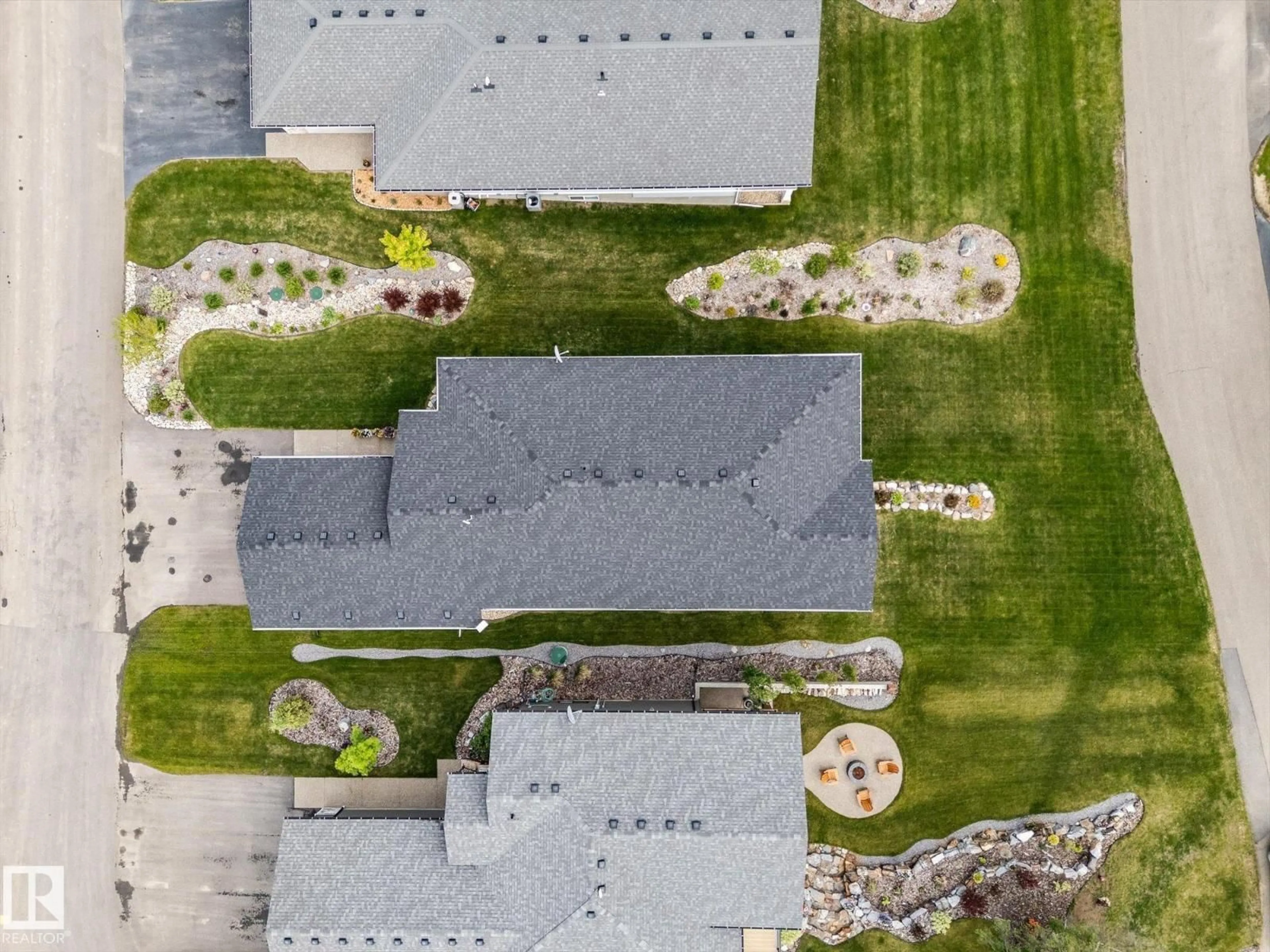 A pic from outside/outdoor area/front of a property/back of a property/a pic from drone, street for 55101 - 218 STE ANNE TRAIL, Rural Lac Ste. Anne County Alberta T0E1A1