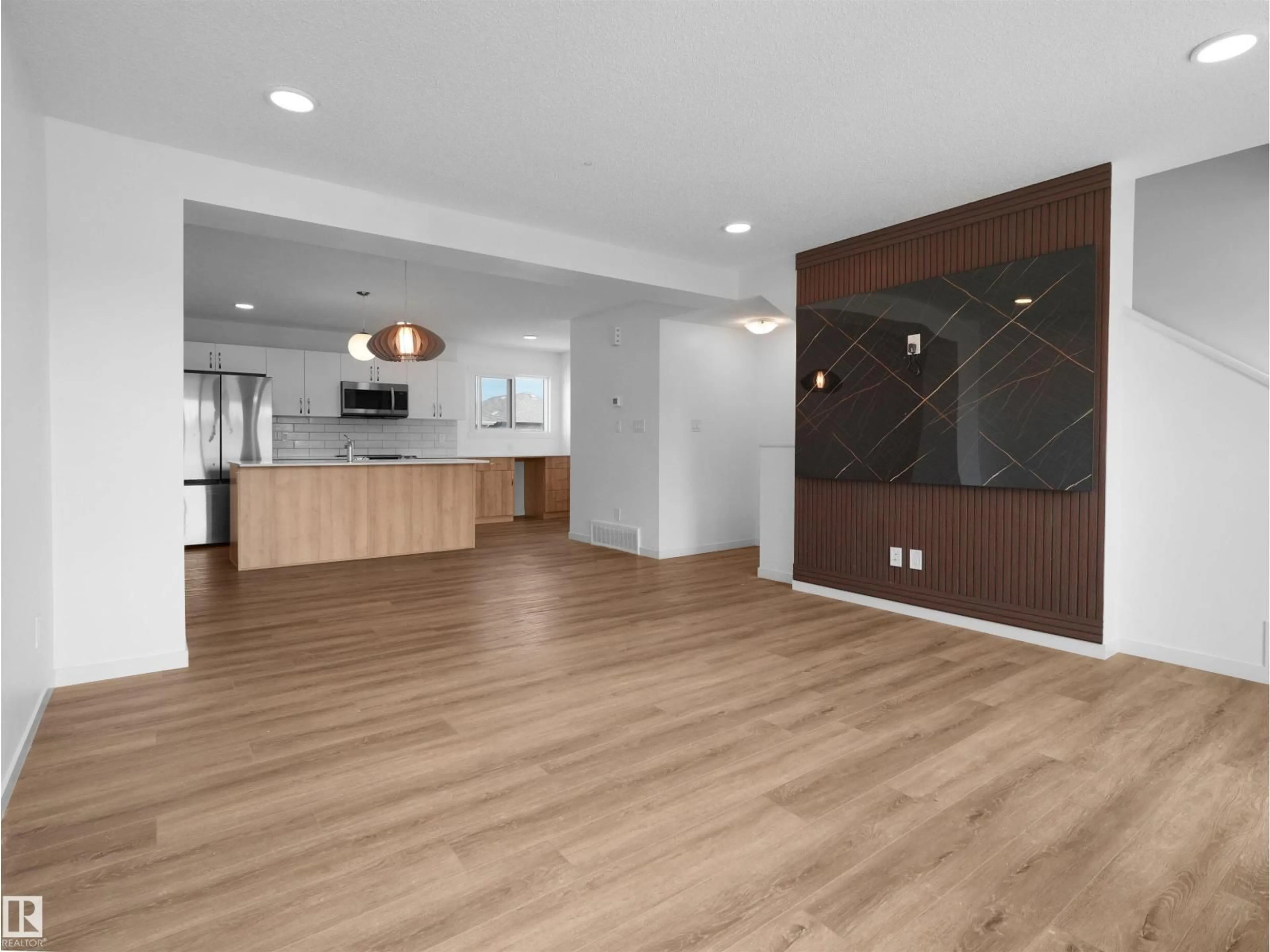 Open concept kitchen, wood/laminate floor for 1230 ASTER BV, Edmonton Alberta T6T2N8