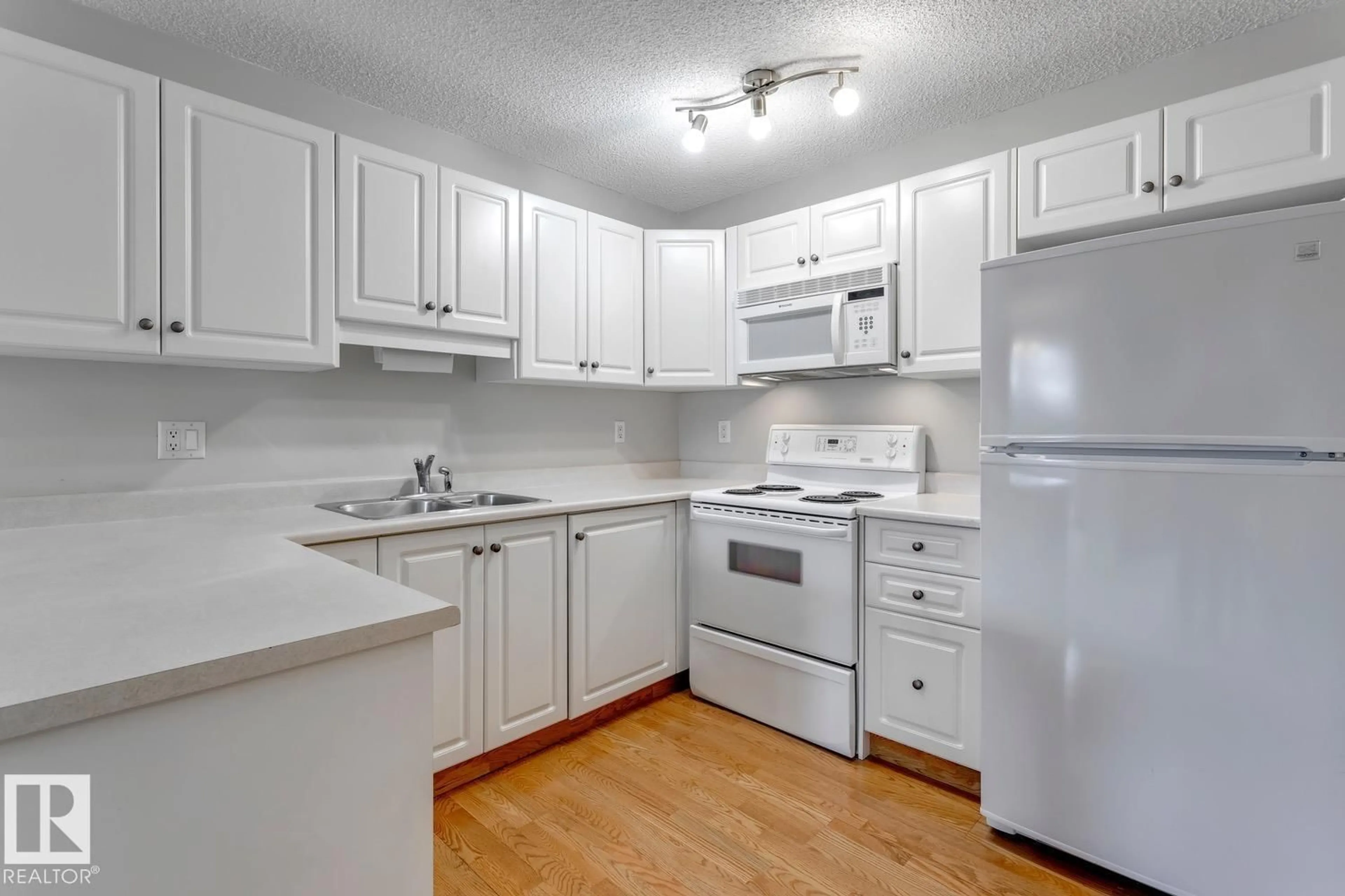 Standard kitchen, unknown for #102 - 10649 SASKATCHEWAN DR, Edmonton Alberta T6E6S8