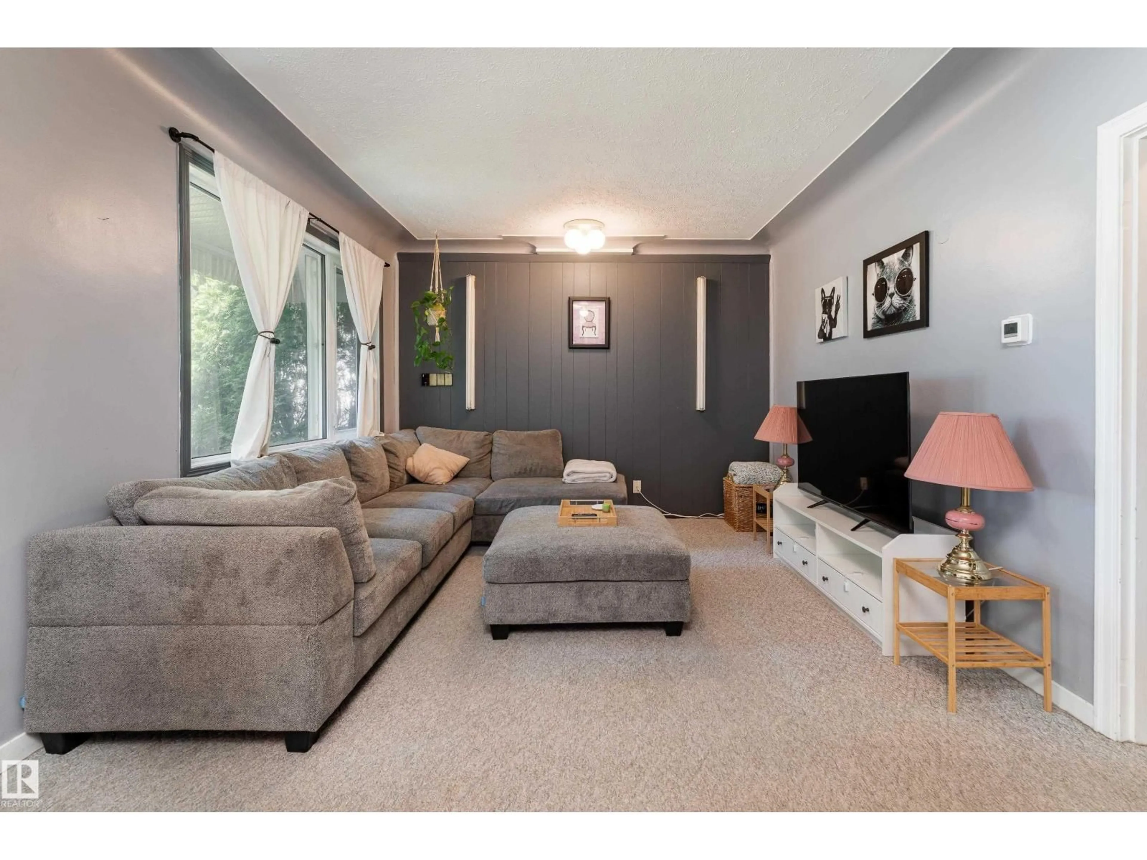 Living room with furniture, unknown for 9011 95 ST, Edmonton Alberta T6C3W7