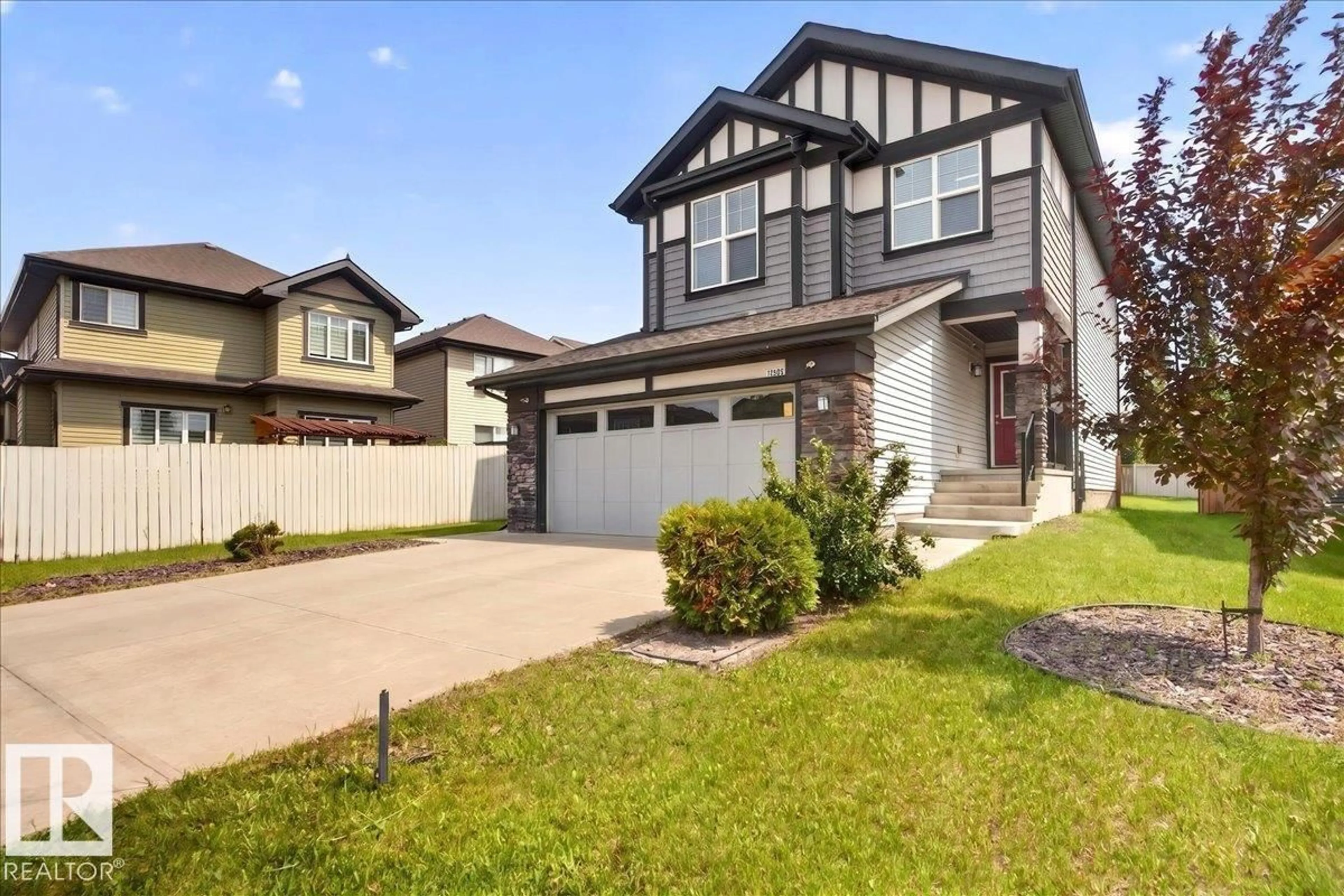 Home with vinyl exterior material, street for 17203 71 ST, Edmonton Alberta T5Z0H1