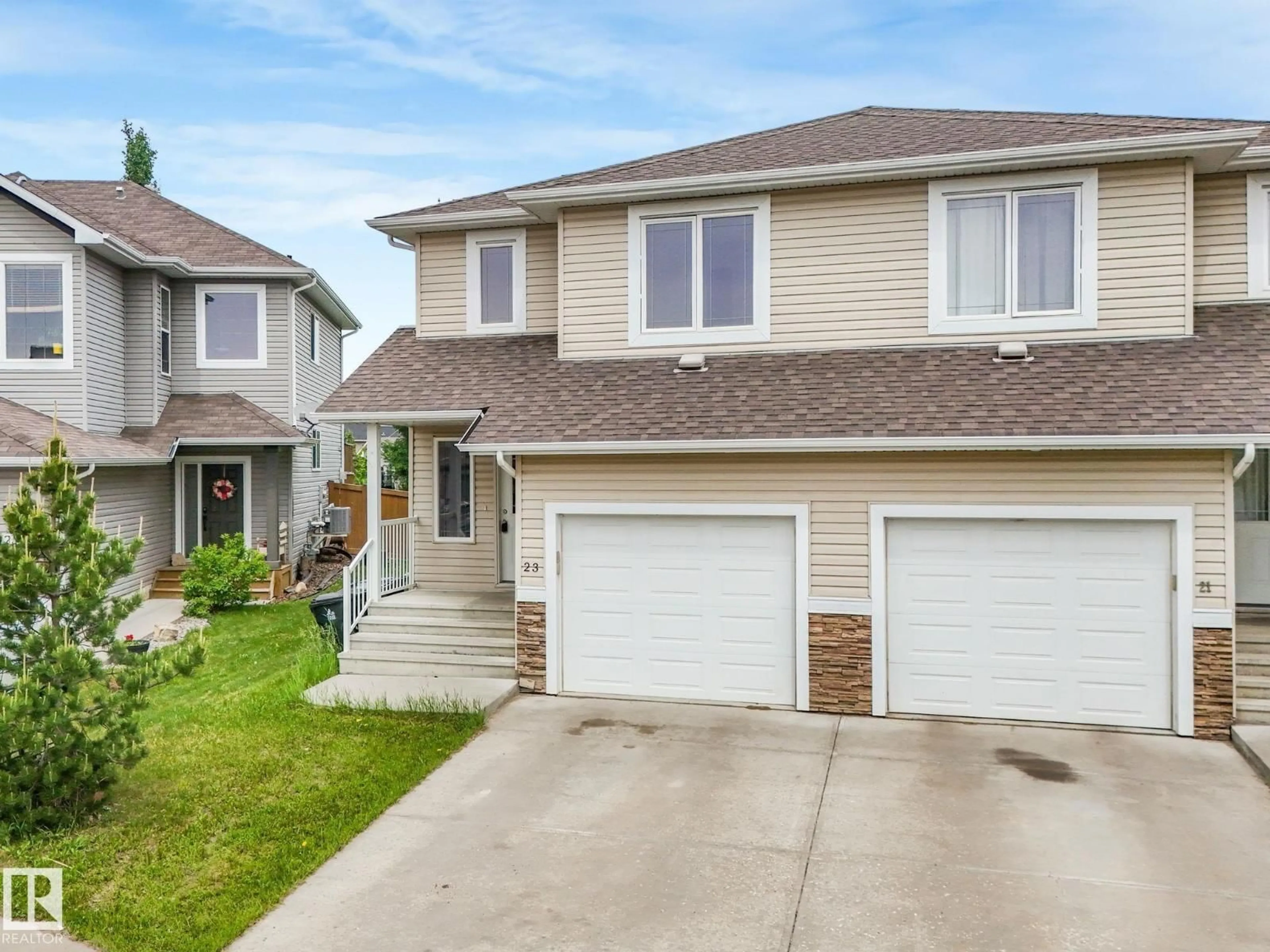 Home with vinyl exterior material, street for 23 ASHBY GD, Spruce Grove Alberta T7X4R5