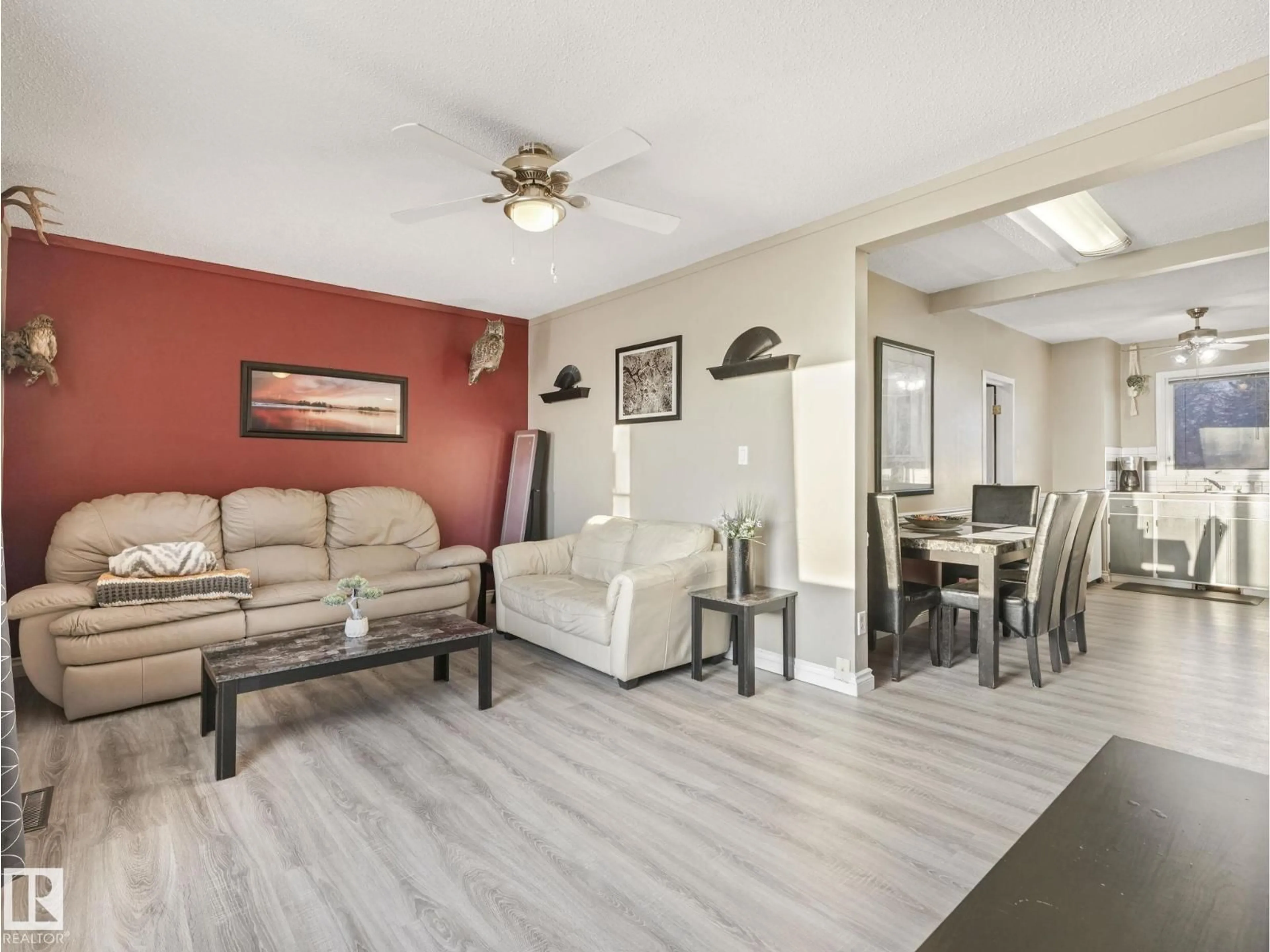 Living room with furniture, wood/laminate floor for 5305 46 ST, Leduc Alberta T9E5W2