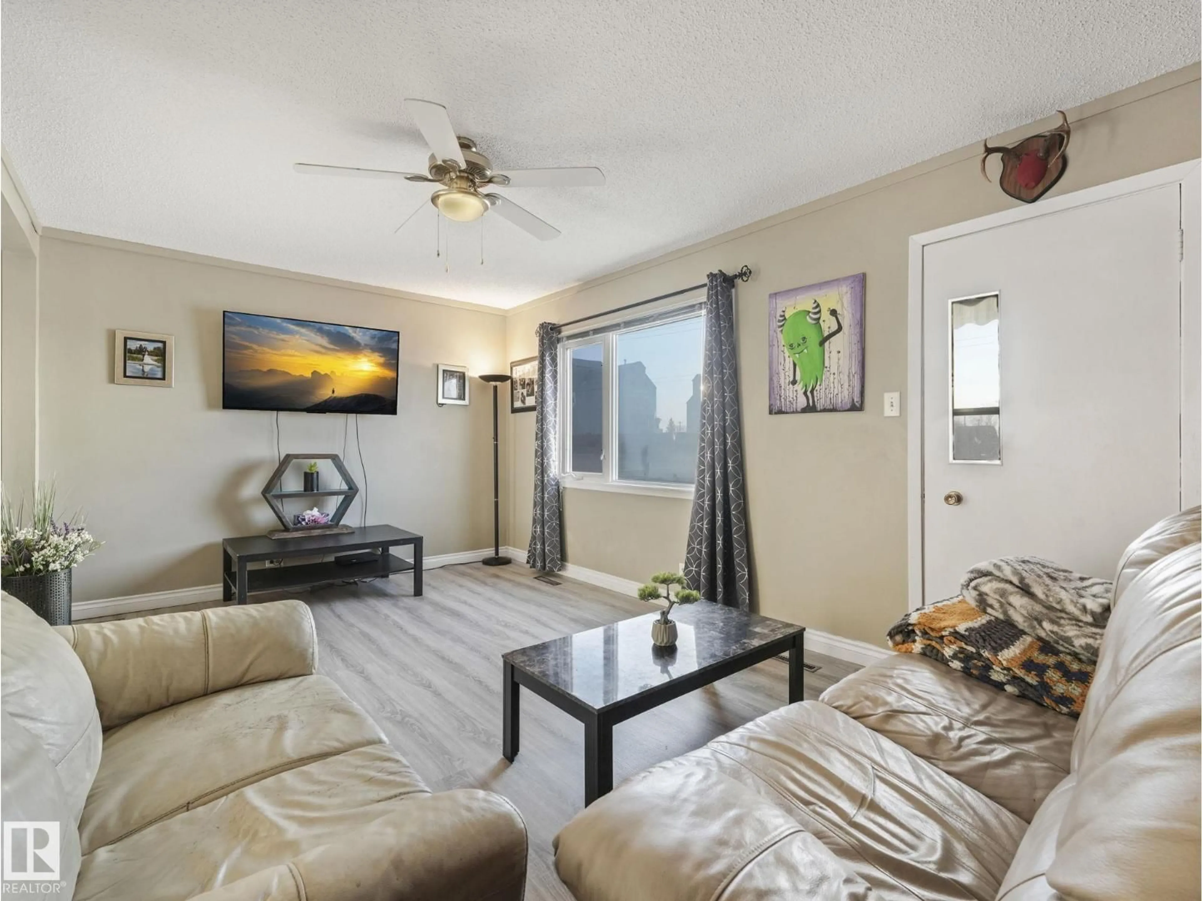 Living room with furniture, unknown for 5305 46 ST, Leduc Alberta T9E5W2