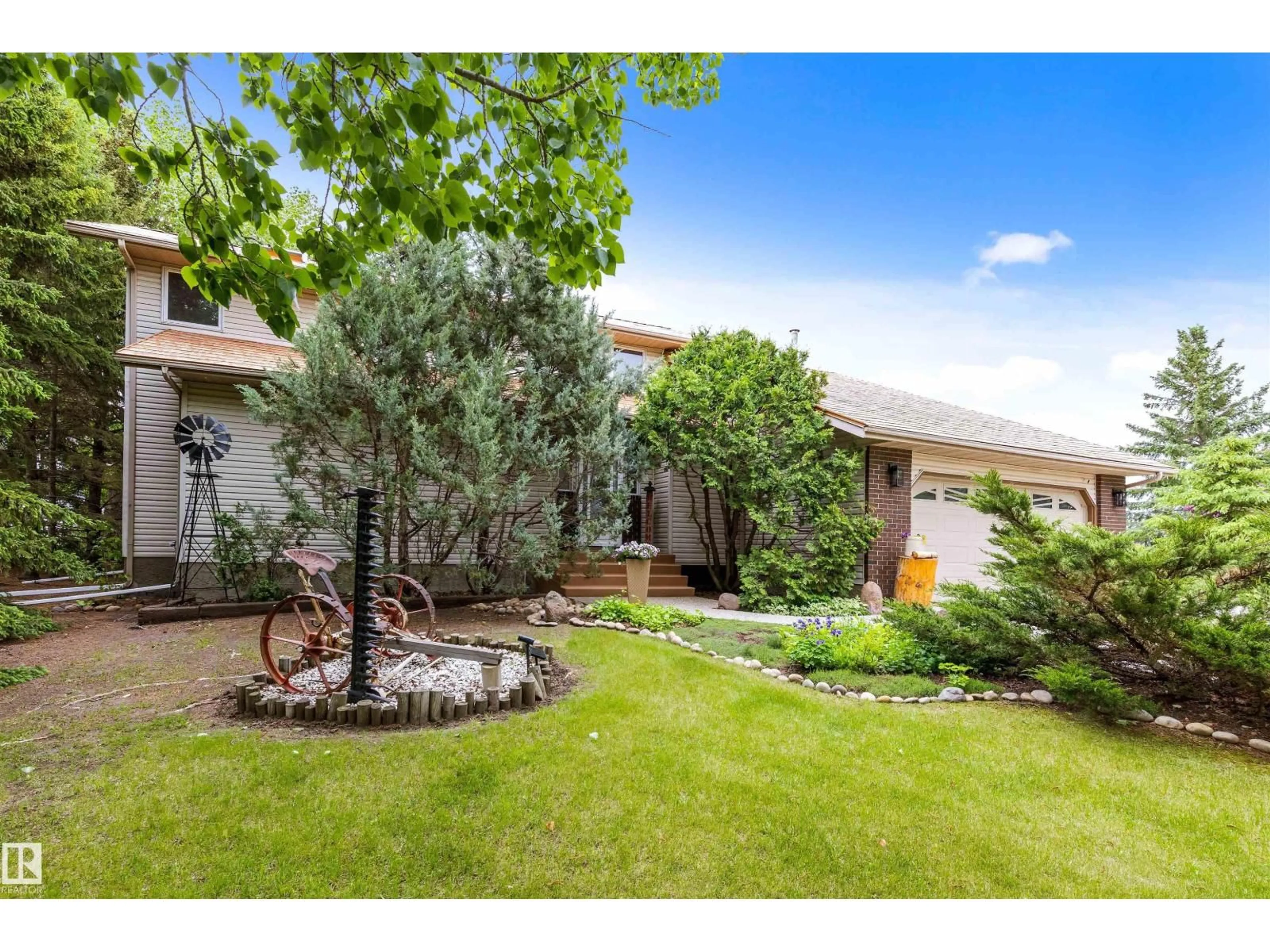 A pic from outside/outdoor area/front of a property/back of a property/a pic from drone, street for 55521 RGE ROAD 233, Rural Sturgeon County Alberta T0A1N1