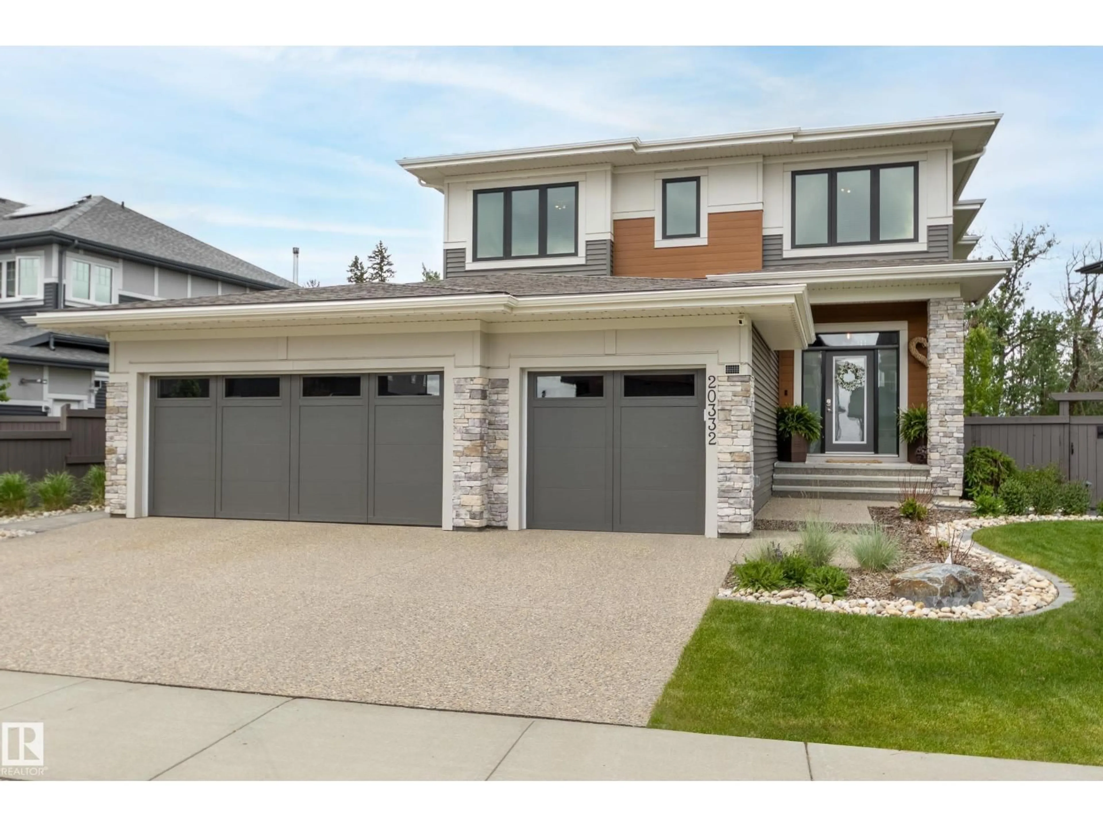 Home with brick exterior material, street for 20332 29 AV, Edmonton Alberta T6M0W5