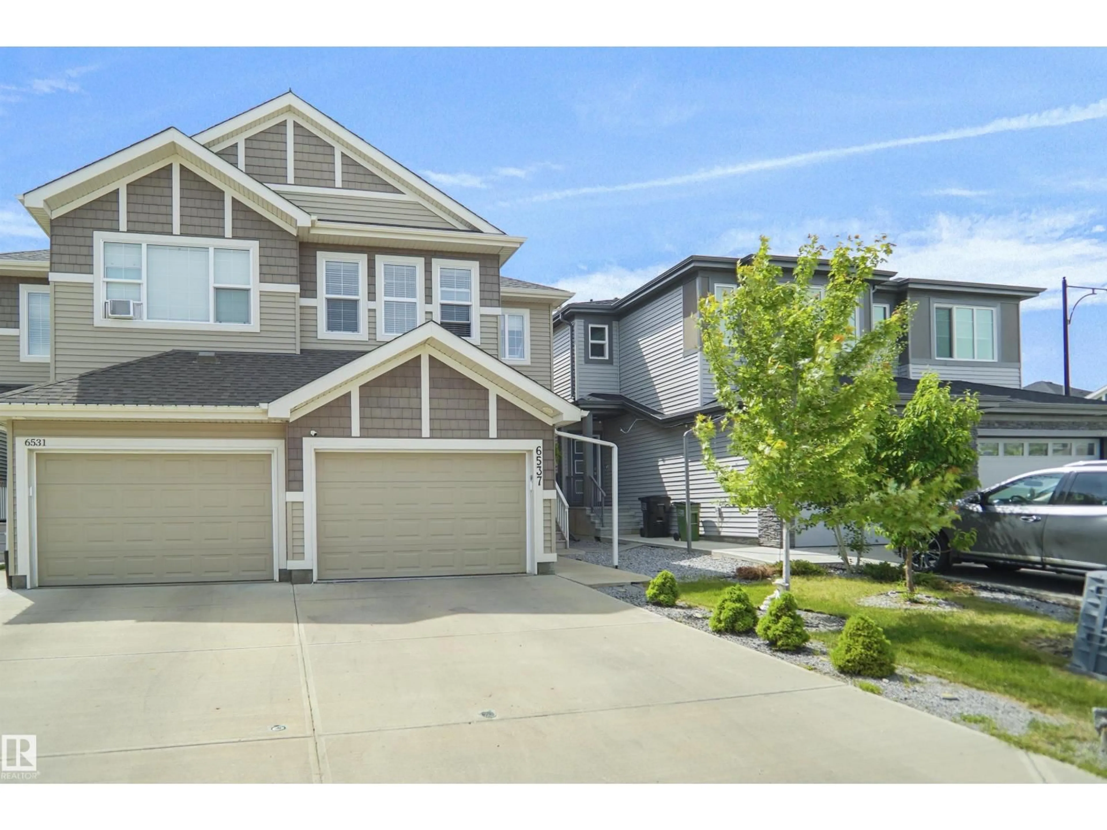 A pic from outside/outdoor area/front of a property/back of a property/a pic from drone, street for NW - 6537 167B AV, Edmonton Alberta T5Y3X8