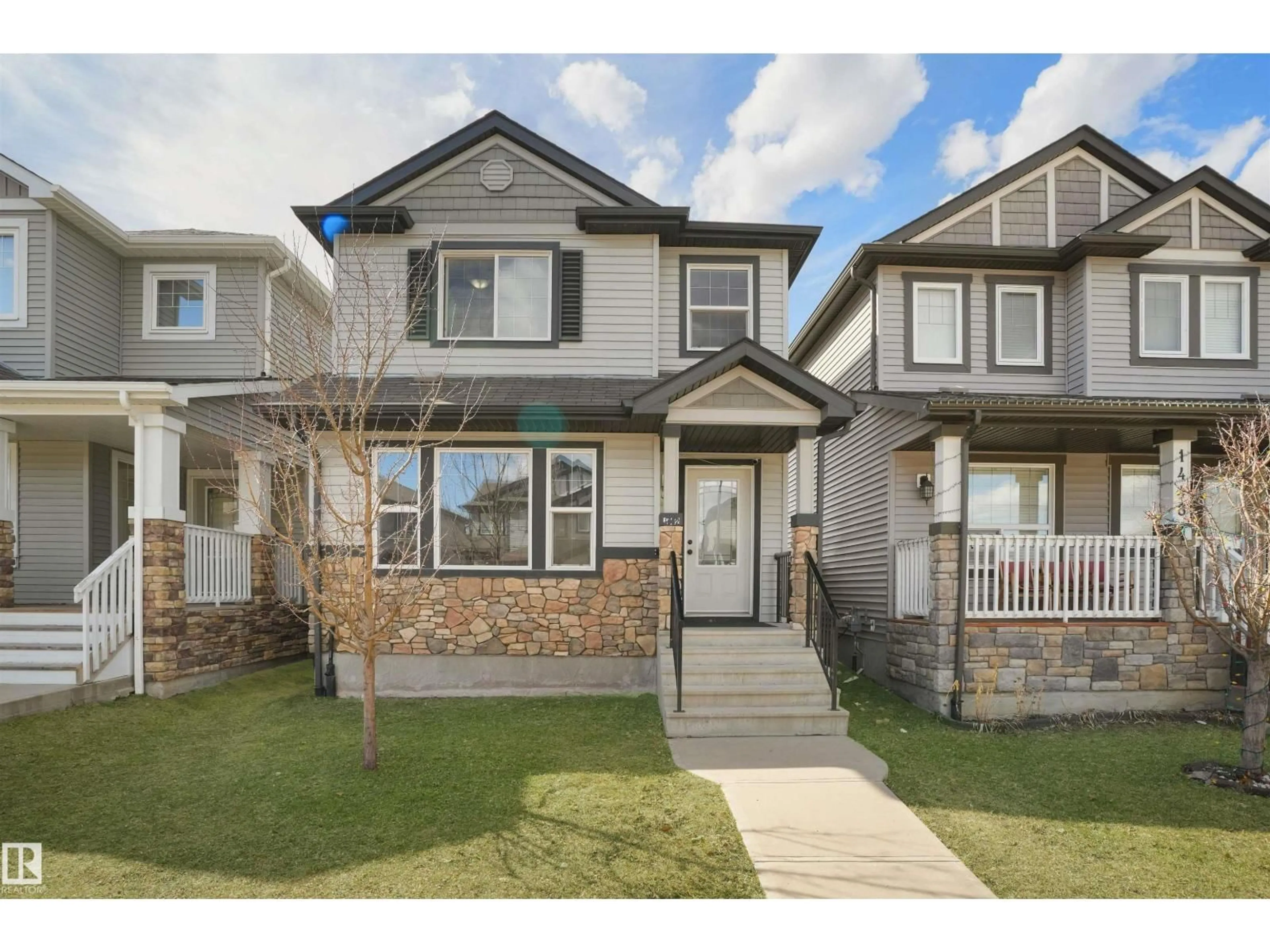 Home with vinyl exterior material, street for NW - 1442 33A ST, Edmonton Alberta T6T0V3