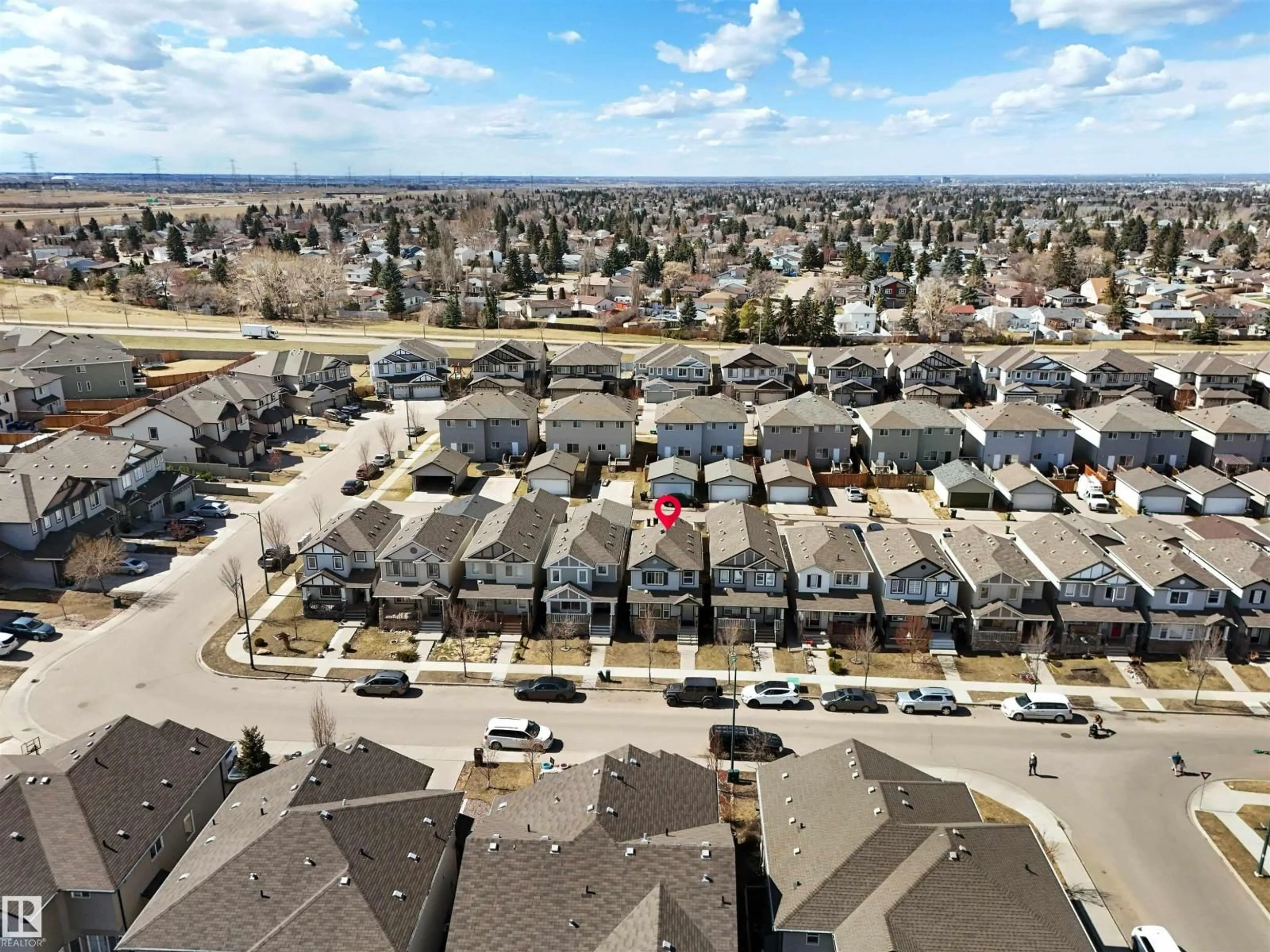 A pic from outside/outdoor area/front of a property/back of a property/a pic from drone, street for NW - 1442 33A ST, Edmonton Alberta T6T0V3