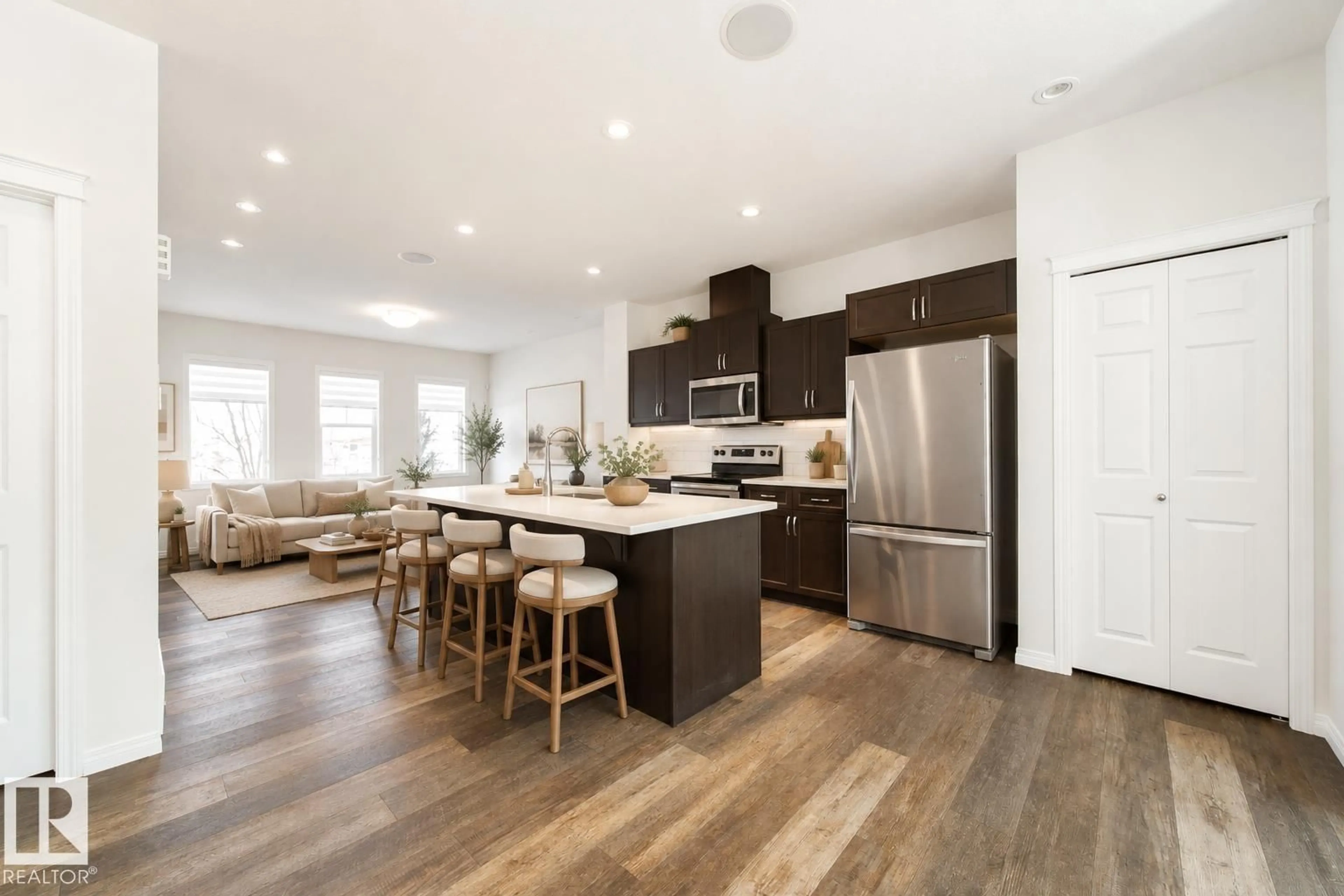 Open concept kitchen, wood/laminate floor for 1199 WATT DR, Edmonton Alberta T6X2P1