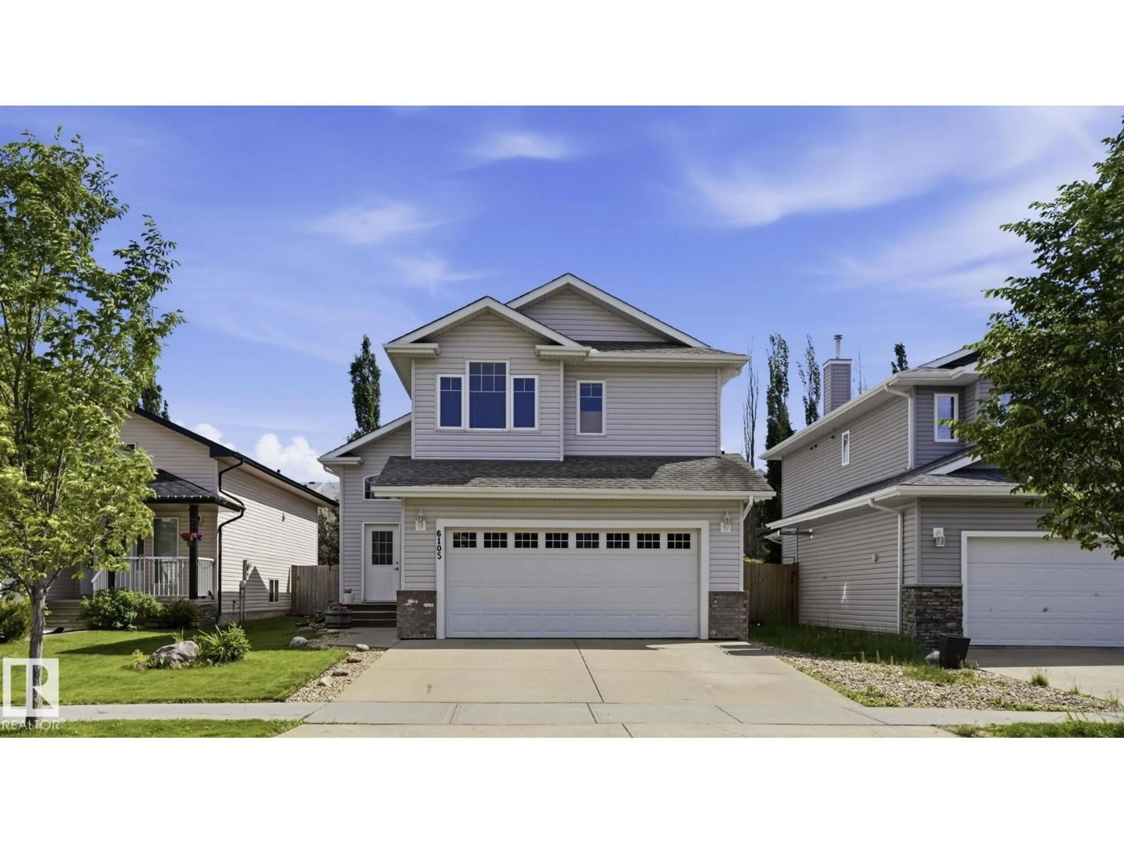 Home with vinyl exterior material, street for 6105 52 AV, Beaumont Alberta T4X1V5