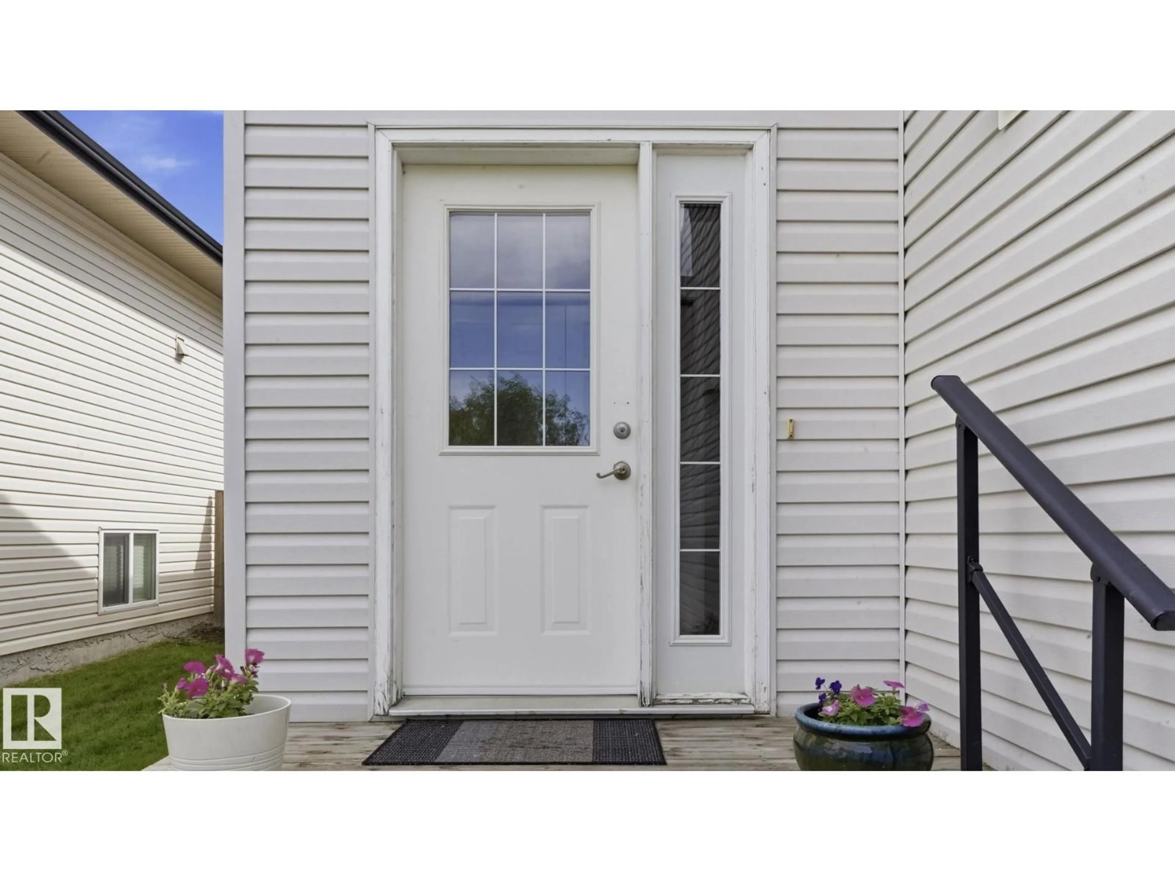 Home with vinyl exterior material, street for 6105 52 AV, Beaumont Alberta T4X1V5