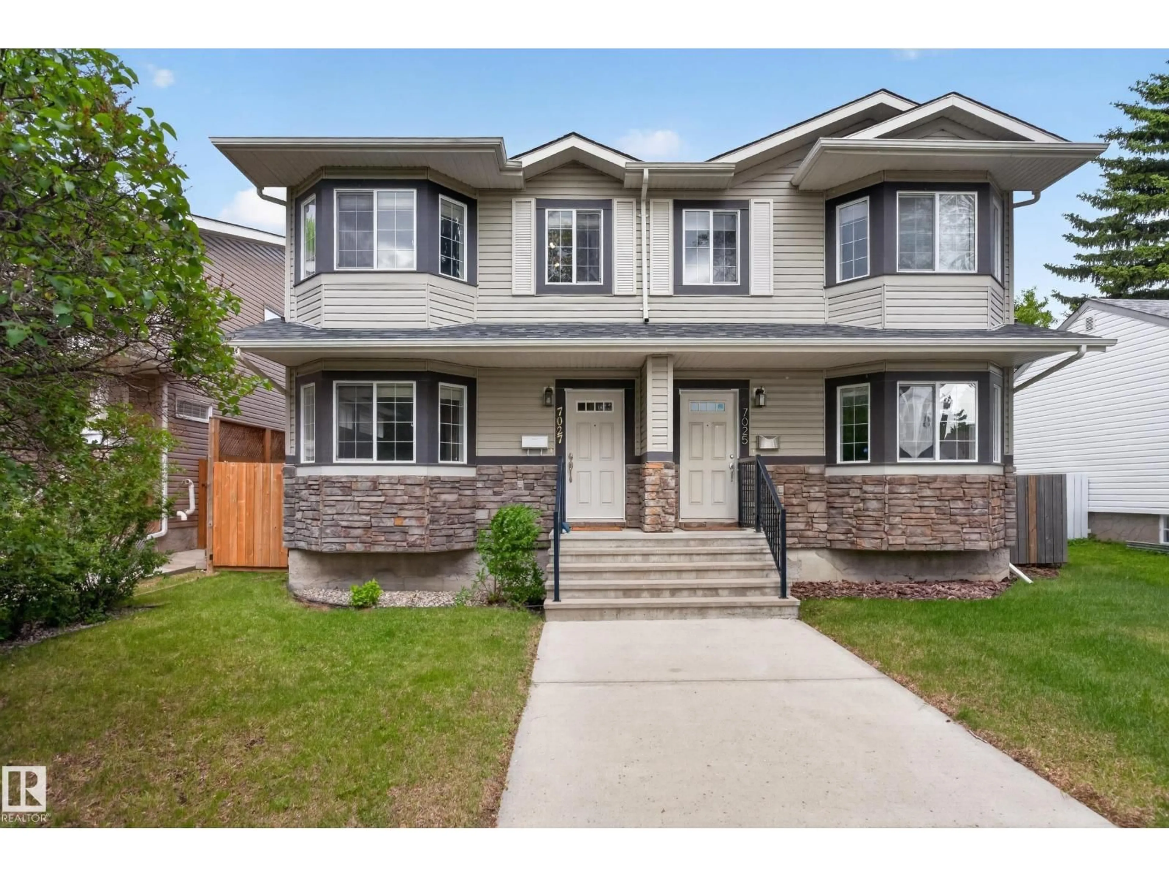 Home with brick exterior material, street for 7027 106 ST NW, Edmonton Alberta T6H2K5