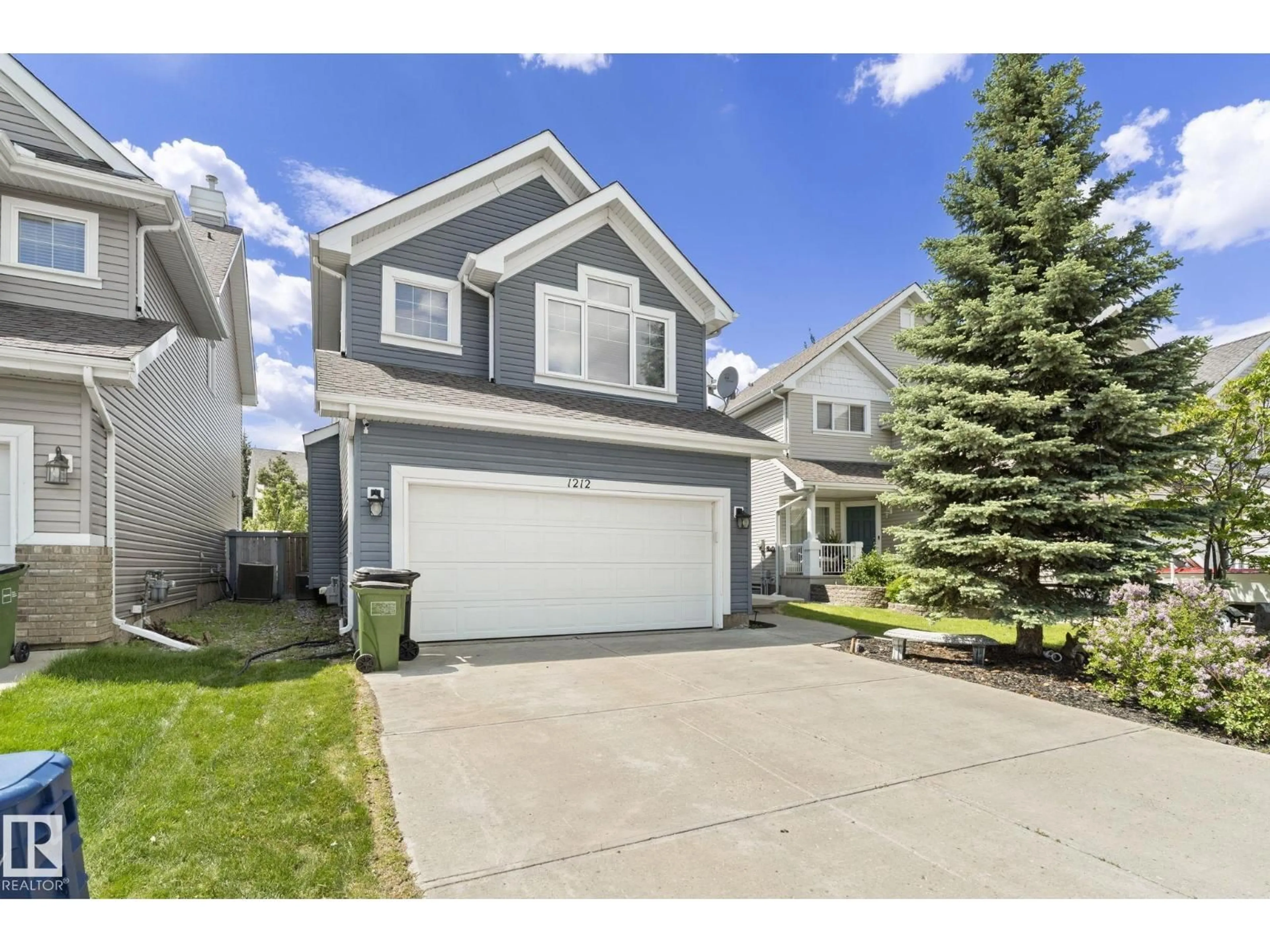 Home with vinyl exterior material, street for SW - 1212 82 ST, Edmonton Alberta T6X1E5