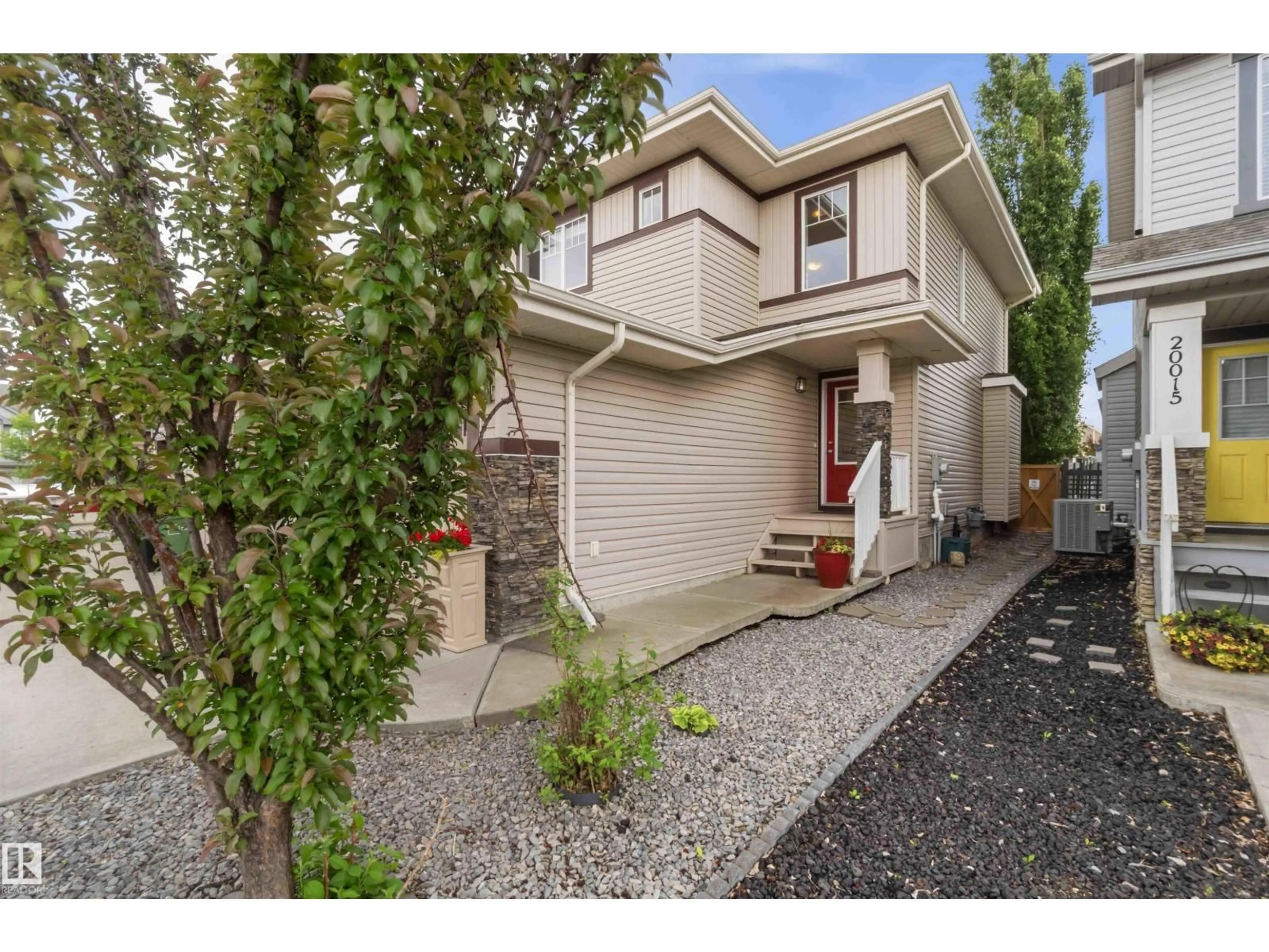 Home with vinyl exterior material, street for 20013 131 AV, Edmonton Alberta T5S0E1