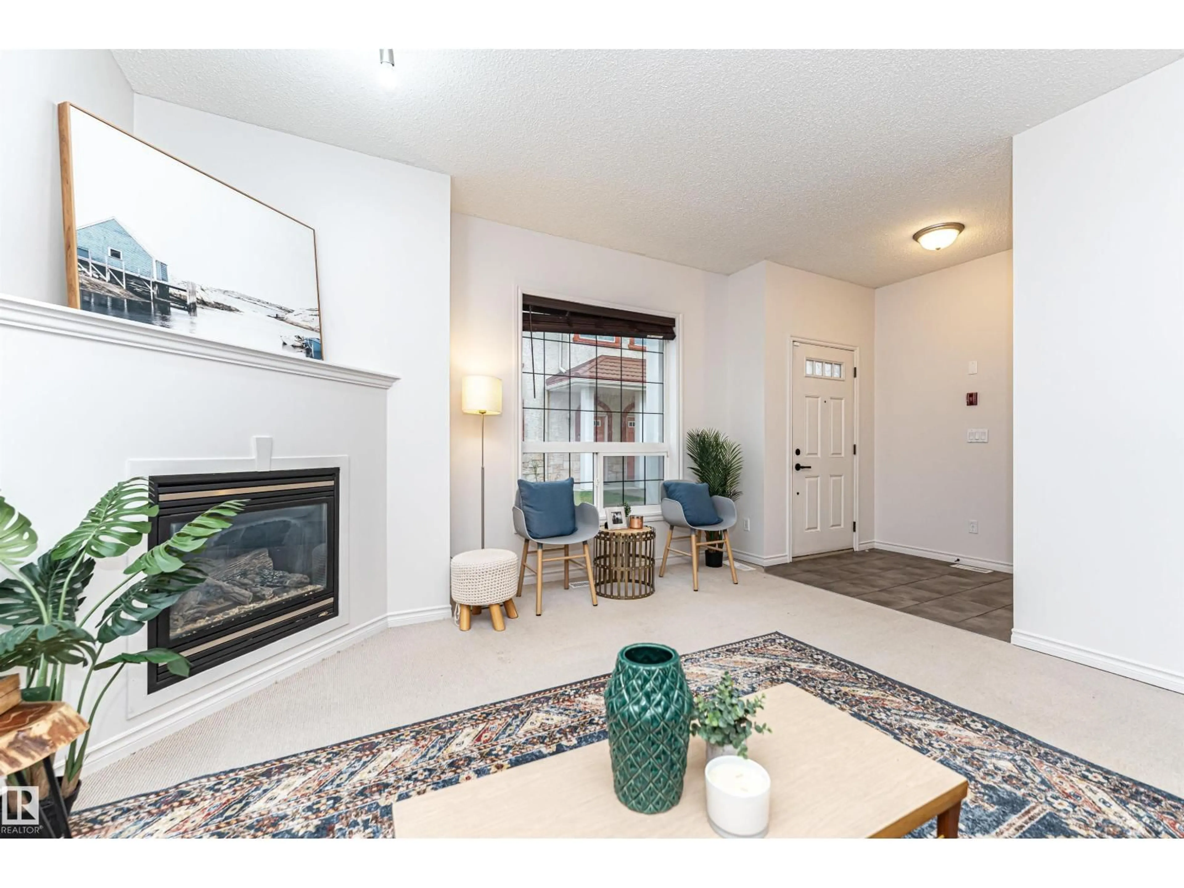 Living room with furniture, unknown for #103 - 13825 155 AV, Edmonton Alberta T6V0B8