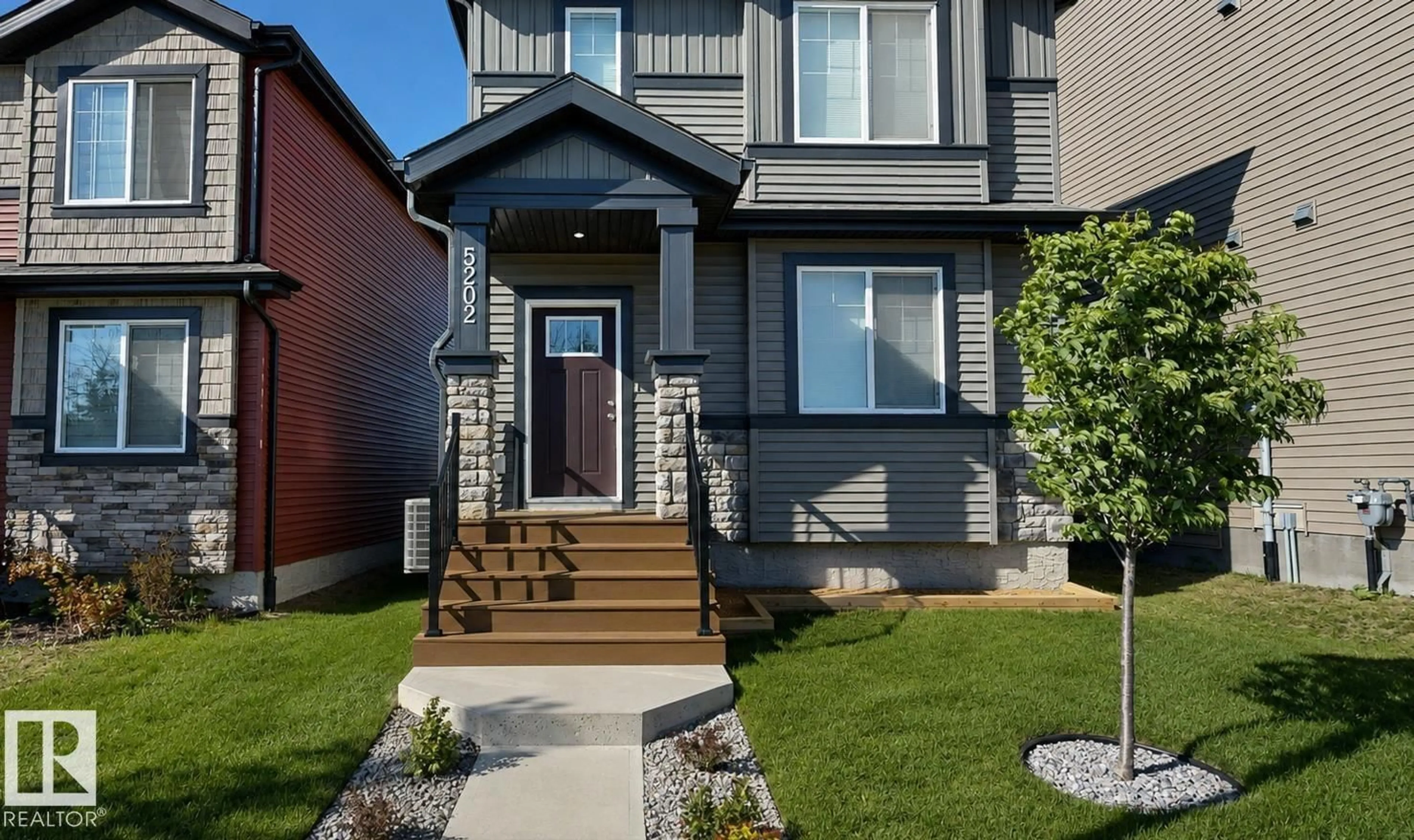 Home with vinyl exterior material, street for 5202 LARK CR, Edmonton Alberta T5S0S3