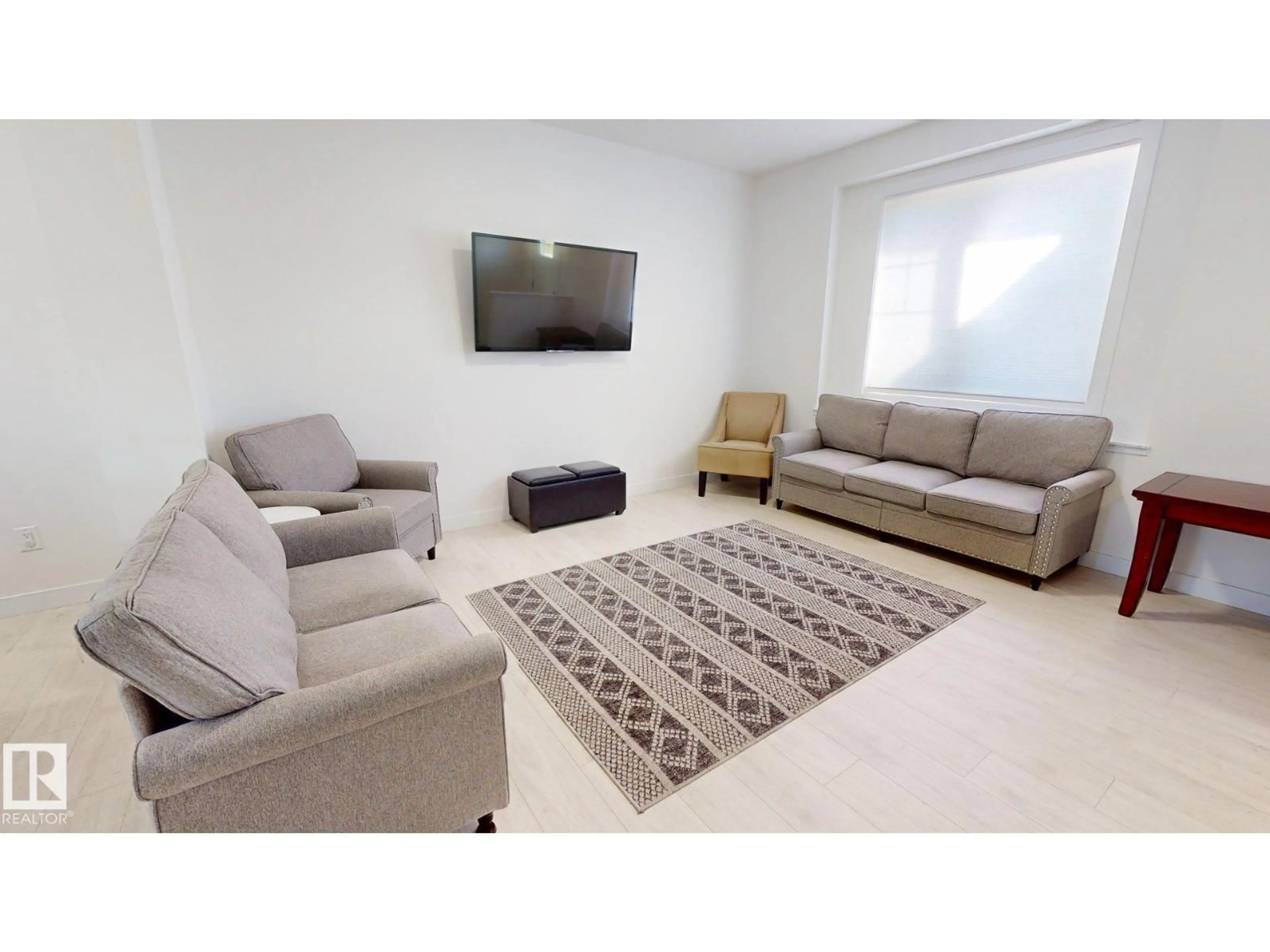 Living room with furniture, carpet floor for 5202 LARK CR, Edmonton Alberta T5S0S3