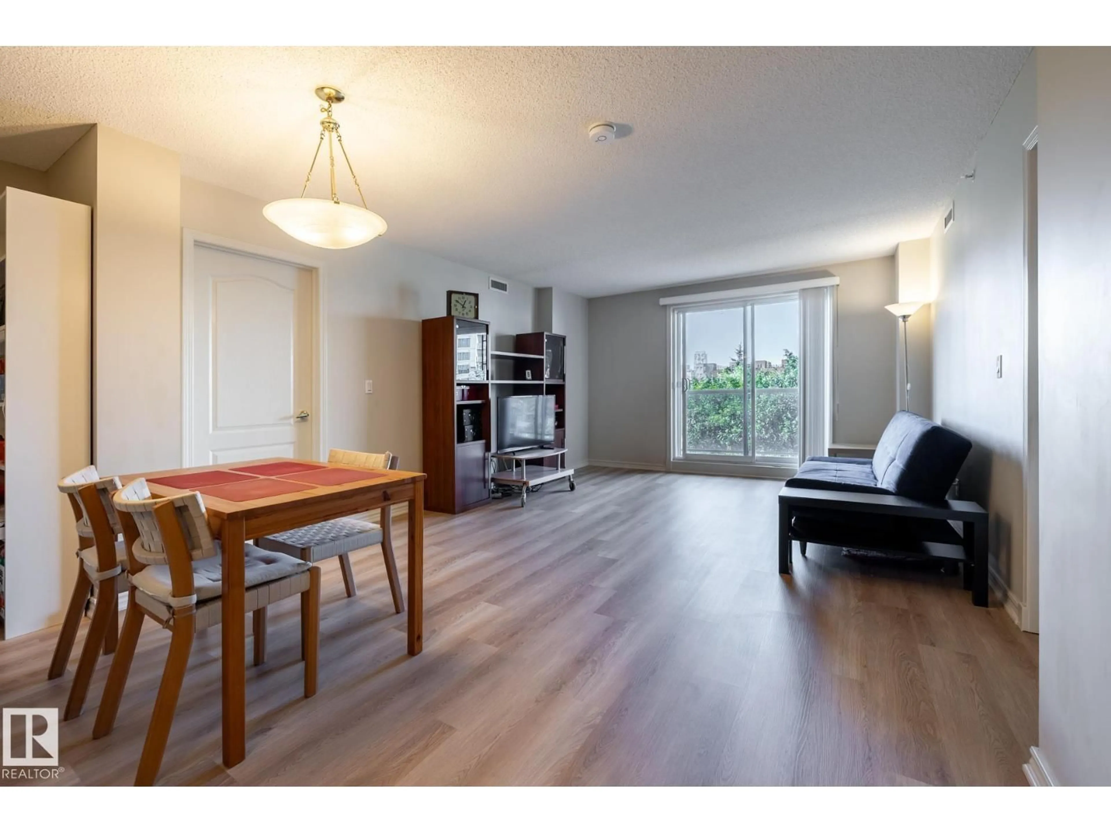 Living room with furniture, wood/laminate floor for #406 - 10909 103 AV, Edmonton Alberta T5K2W7