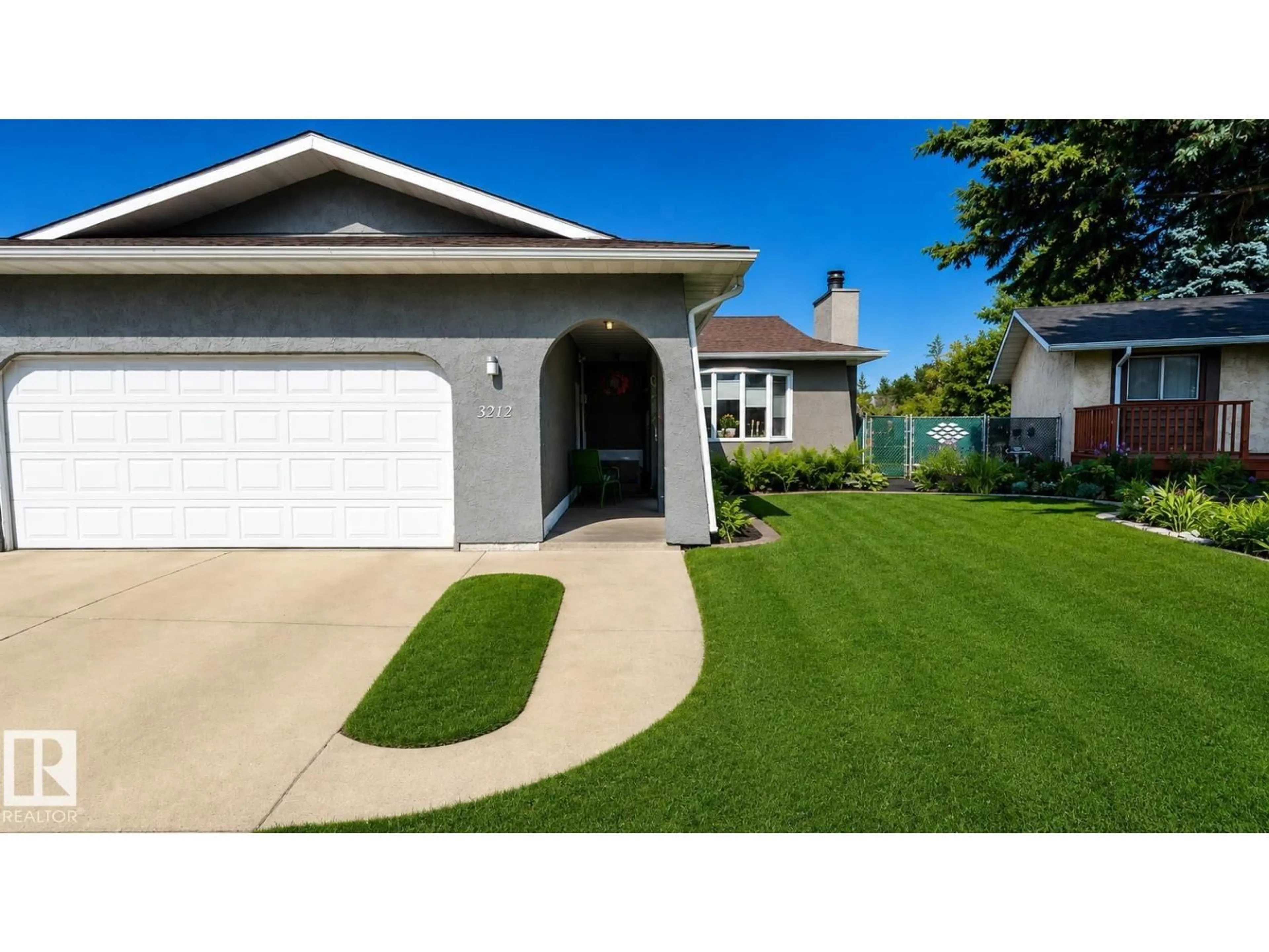 Home with vinyl exterior material, street for 3212 73 ST, Edmonton Alberta T6K1K1