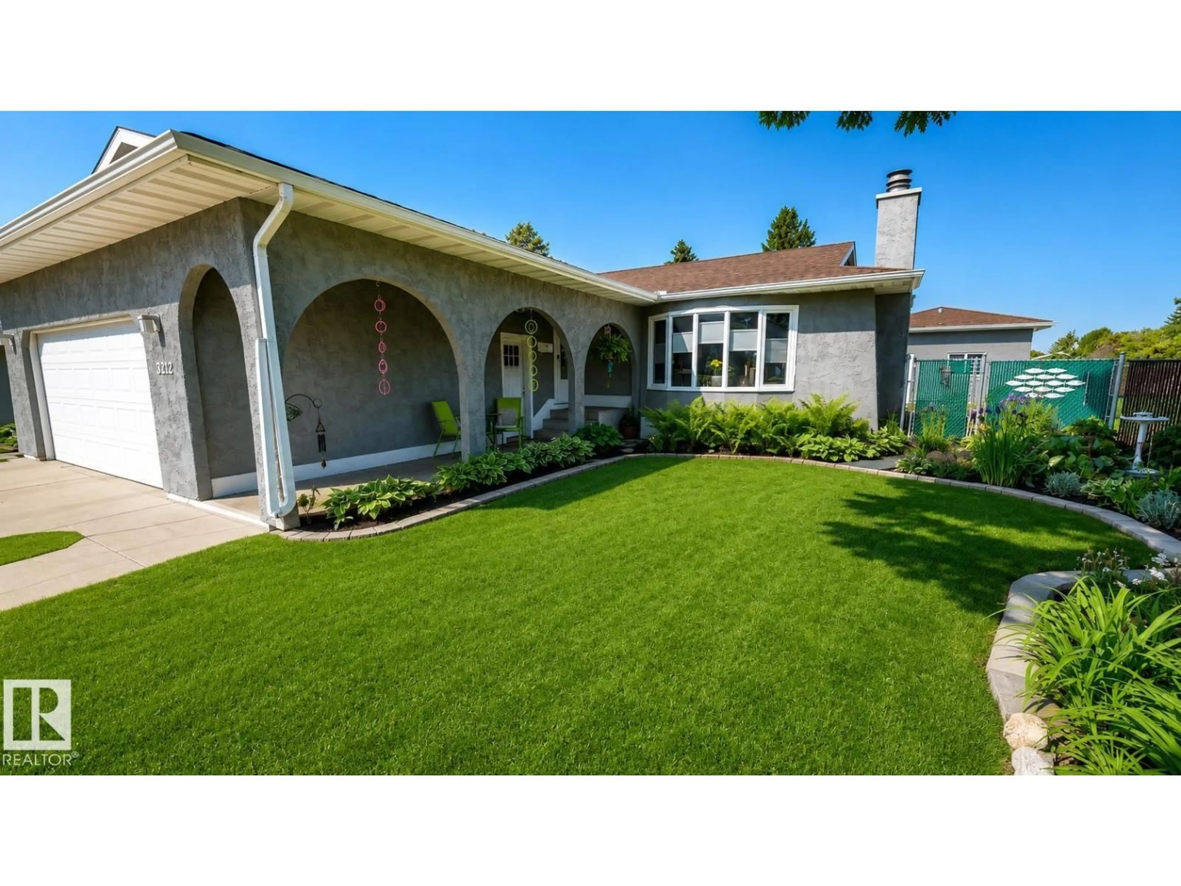 Home with vinyl exterior material, street for 3212 73 ST, Edmonton Alberta T6K1K1