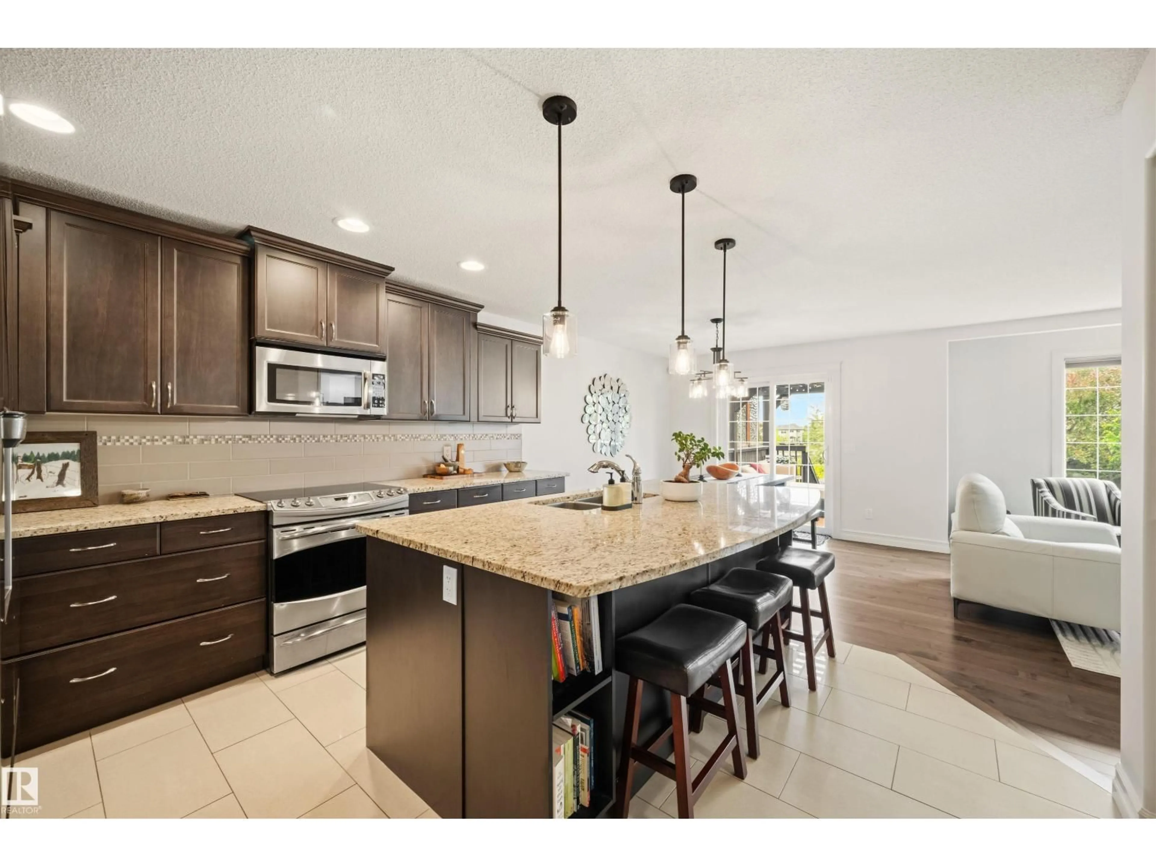 Open concept kitchen, ceramic/tile floor for SW - 525 173A ST, Edmonton Alberta T6W0M6