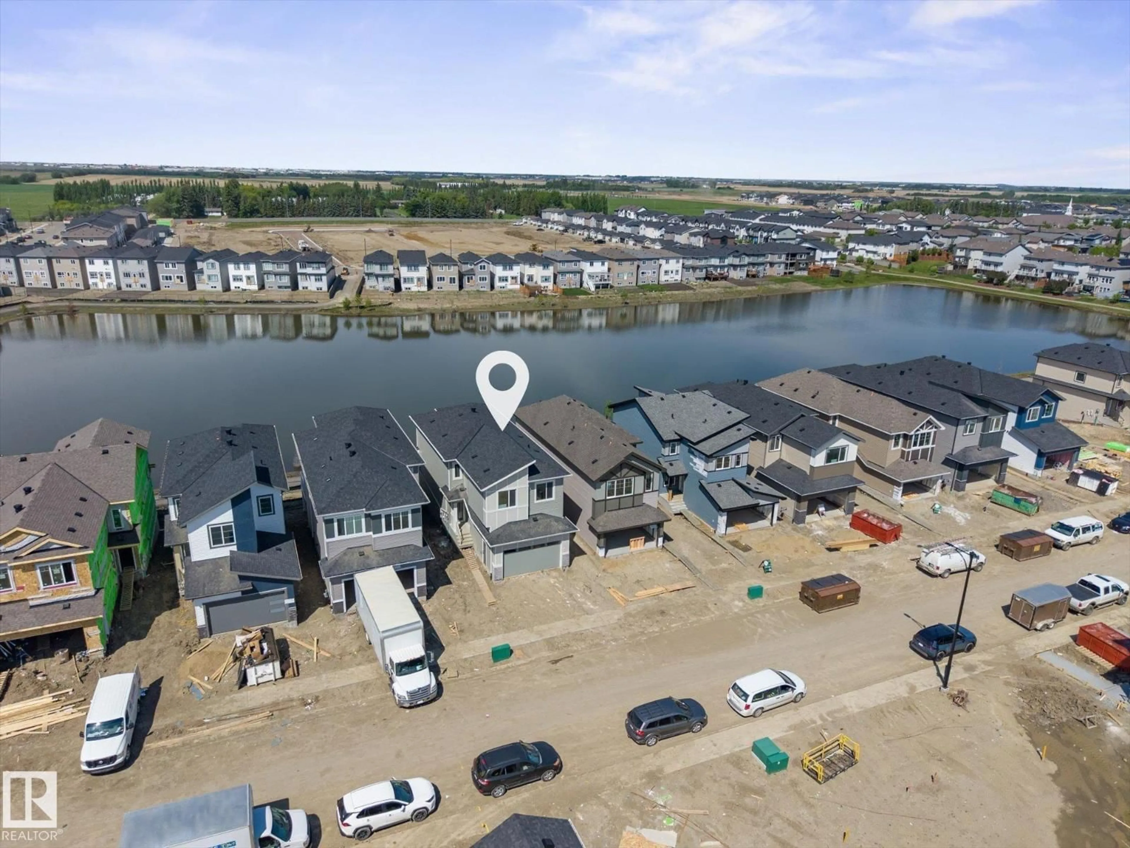 A pic from outside/outdoor area/front of a property/back of a property/a pic from drone, water/lake/river/ocean view for 4224 63 STREET, Beaumont Alberta T4X3E9
