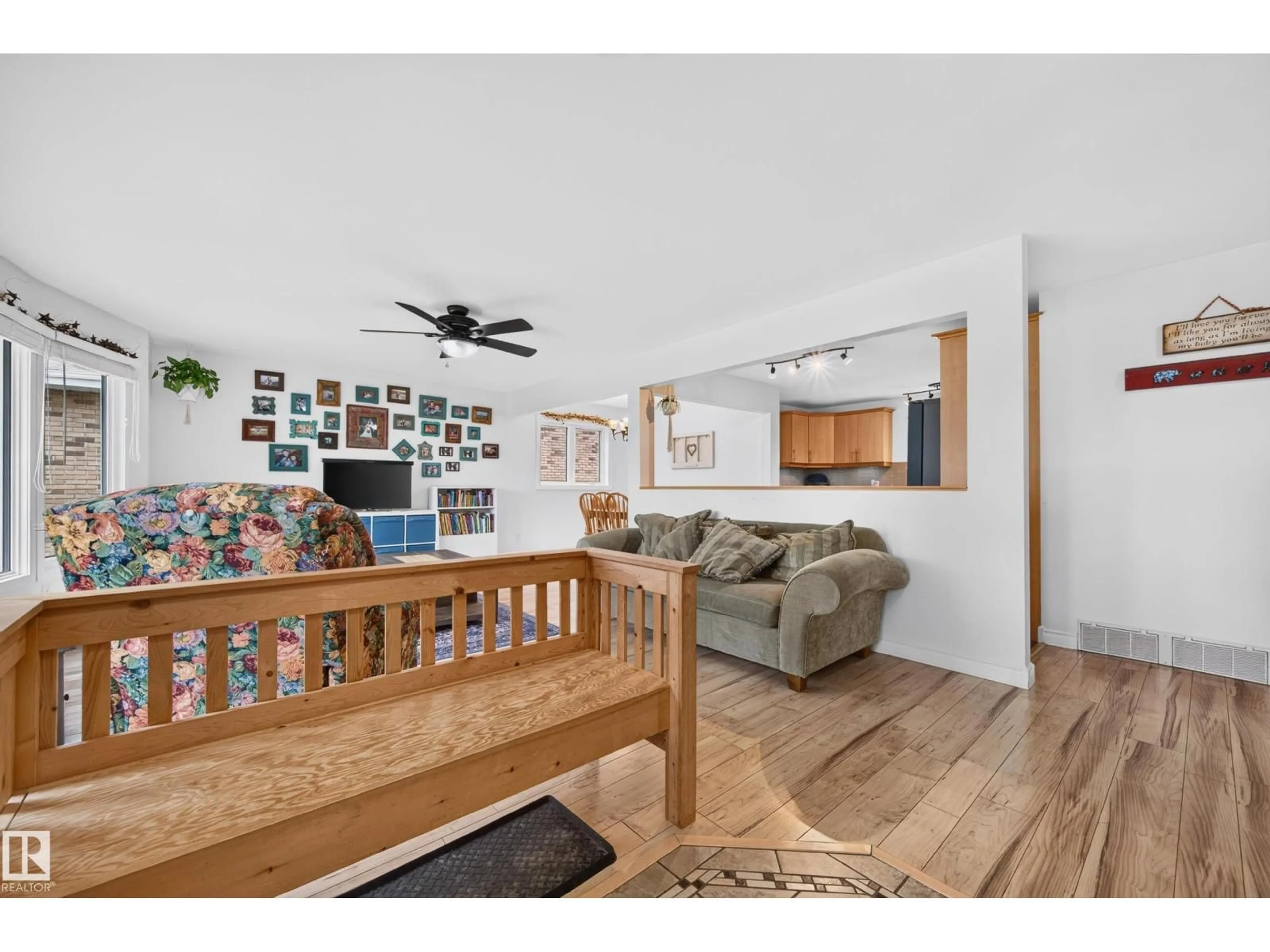 Living room with furniture, wood/laminate floor for 12 BURLINGTON AV, Spruce Grove Alberta T7X1E5