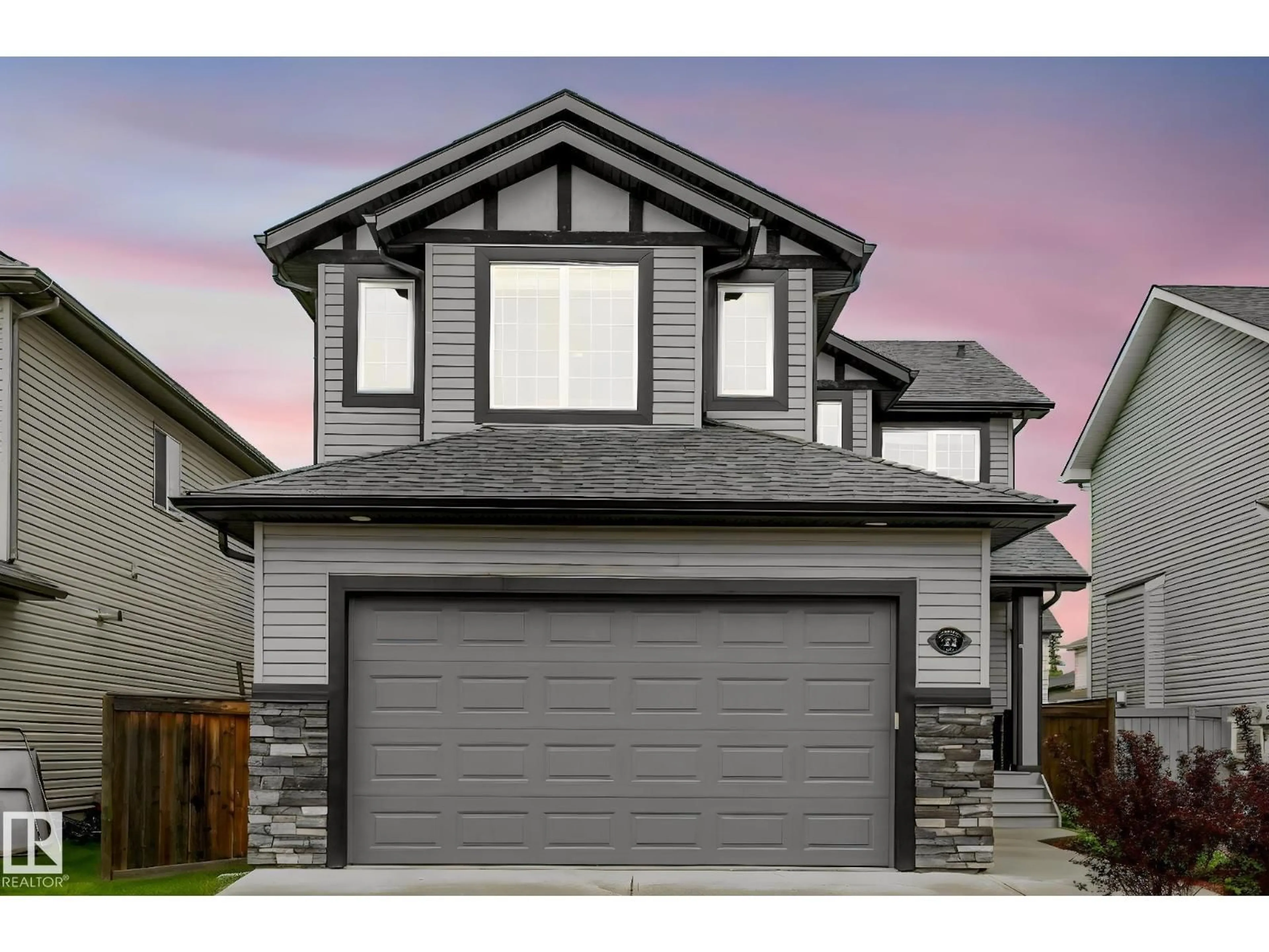 Home with vinyl exterior material, street for 32 HARRINGTON BA, Spruce Grove Alberta T7X0G7