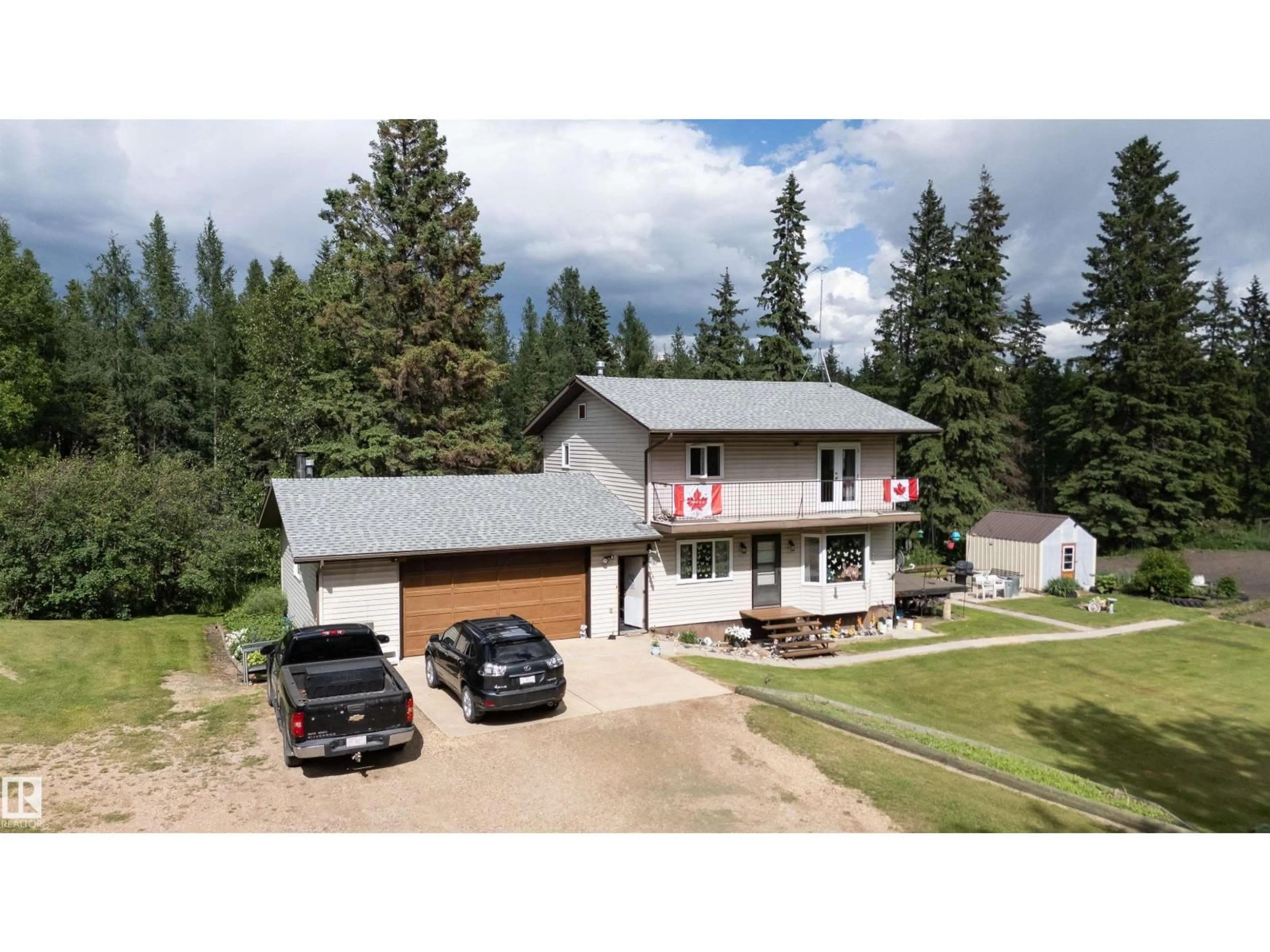 A pic from outside/outdoor area/front of a property/back of a property/a pic from drone, unknown for 58403 RR 60, Rural Barrhead County Alberta T7N1N3