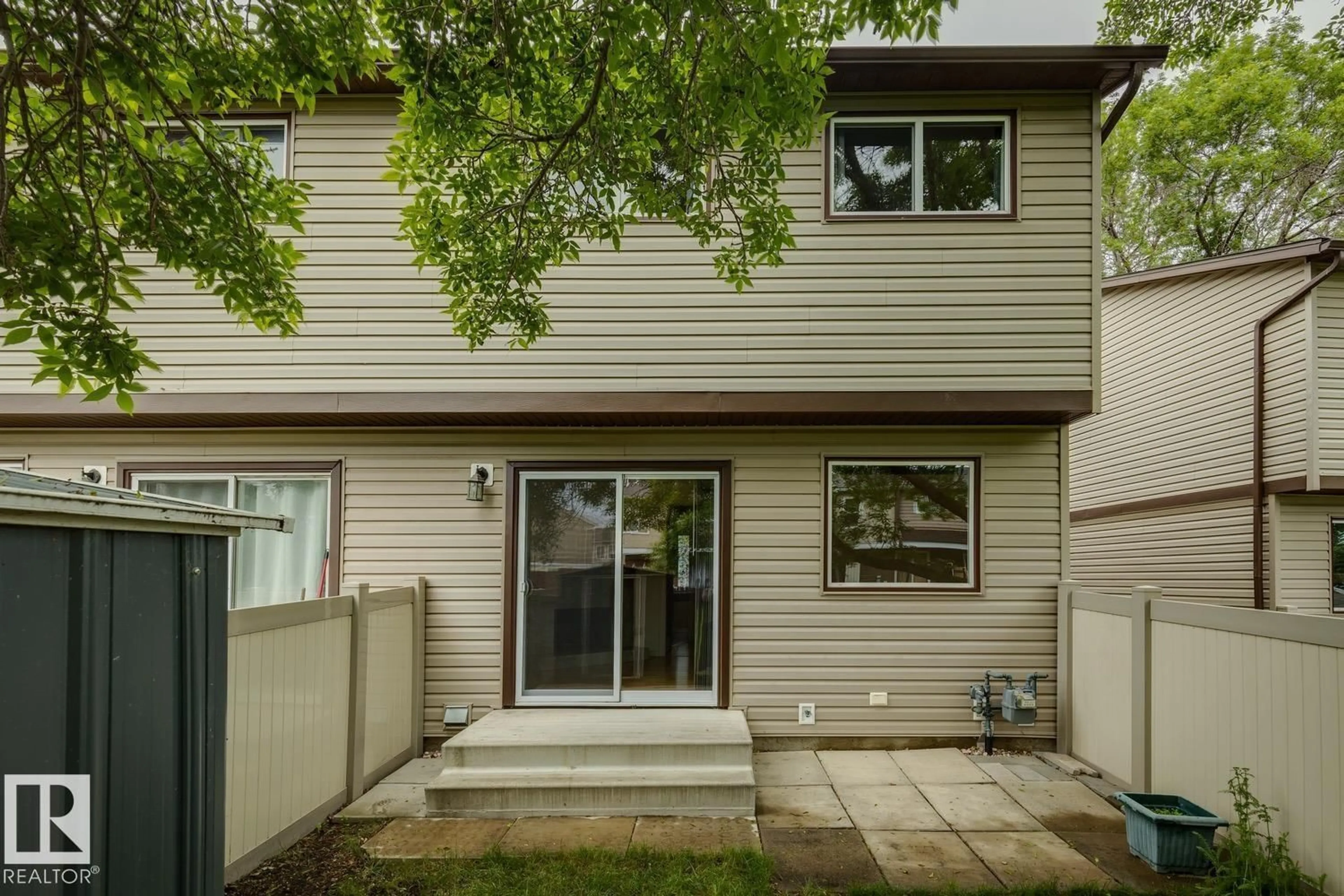 Home with vinyl exterior material, street for 1131 HOOKE RD, Edmonton Alberta T5A4A5