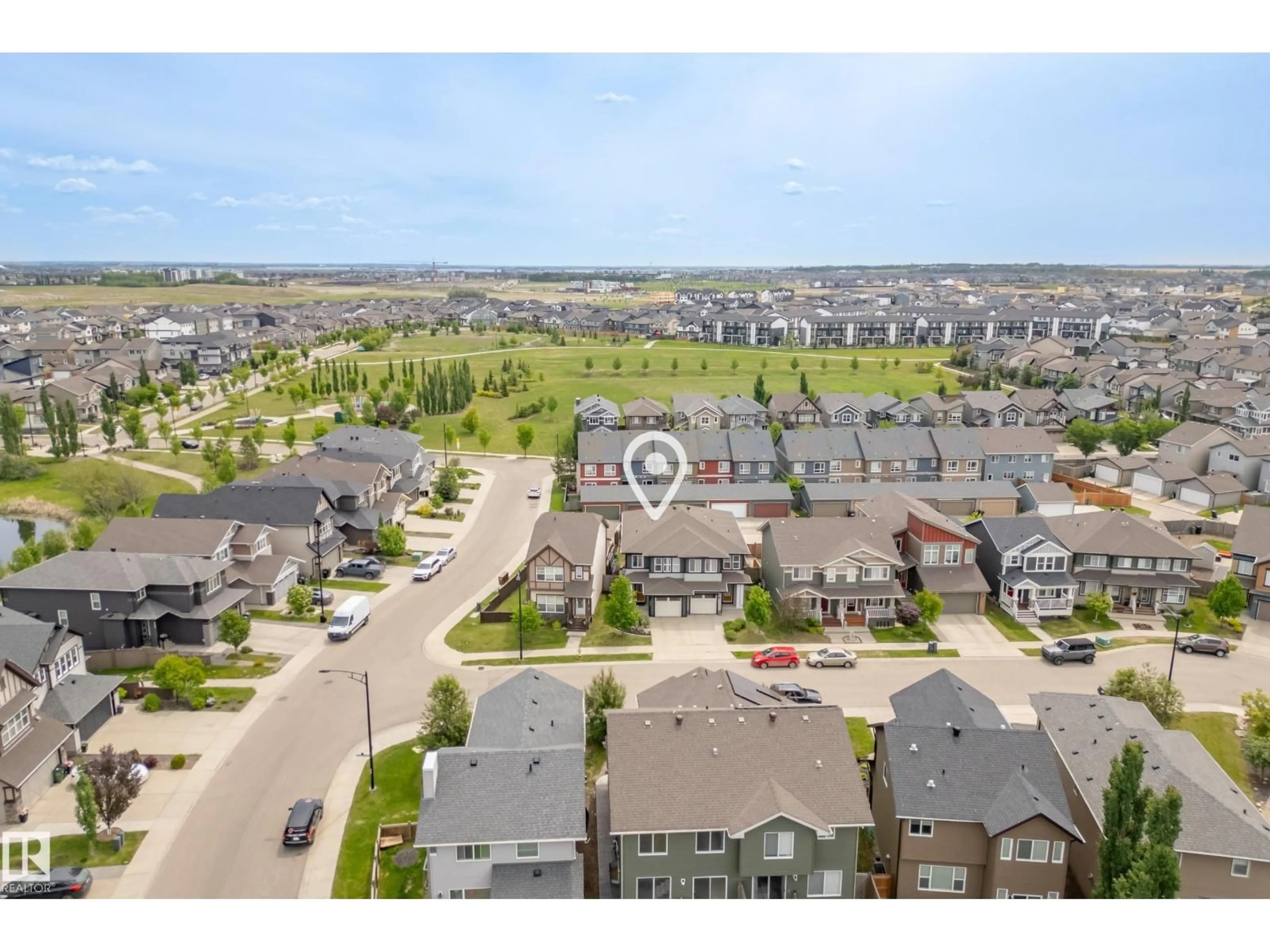 A pic from outside/outdoor area/front of a property/back of a property/a pic from drone, unknown for SW - 3805 POWELL WD, Edmonton Alberta T6W2W9