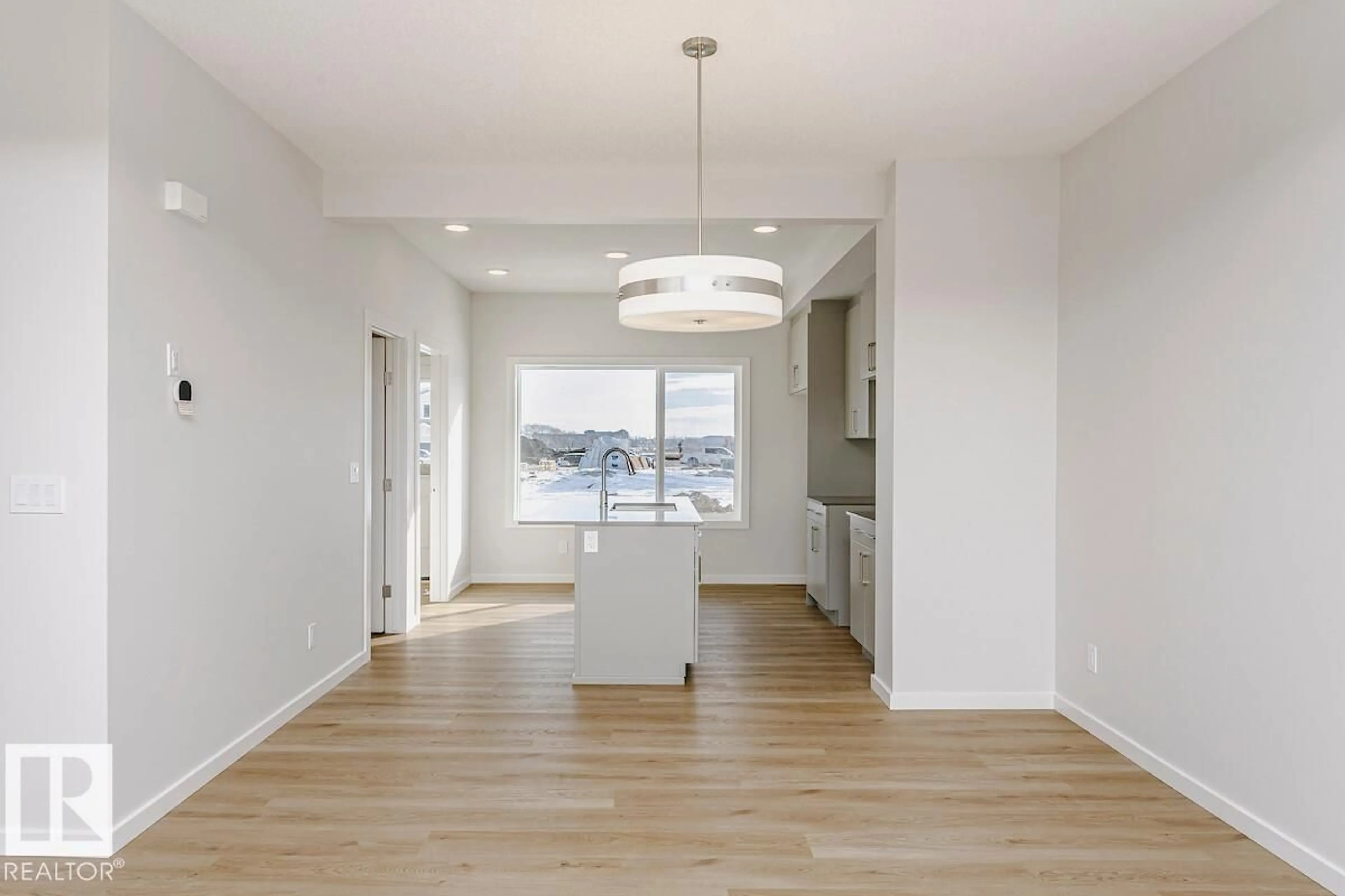 Open concept kitchen, wood/laminate floor for 29 MCLEOD AV, Spruce Grove Alberta T7X4B8