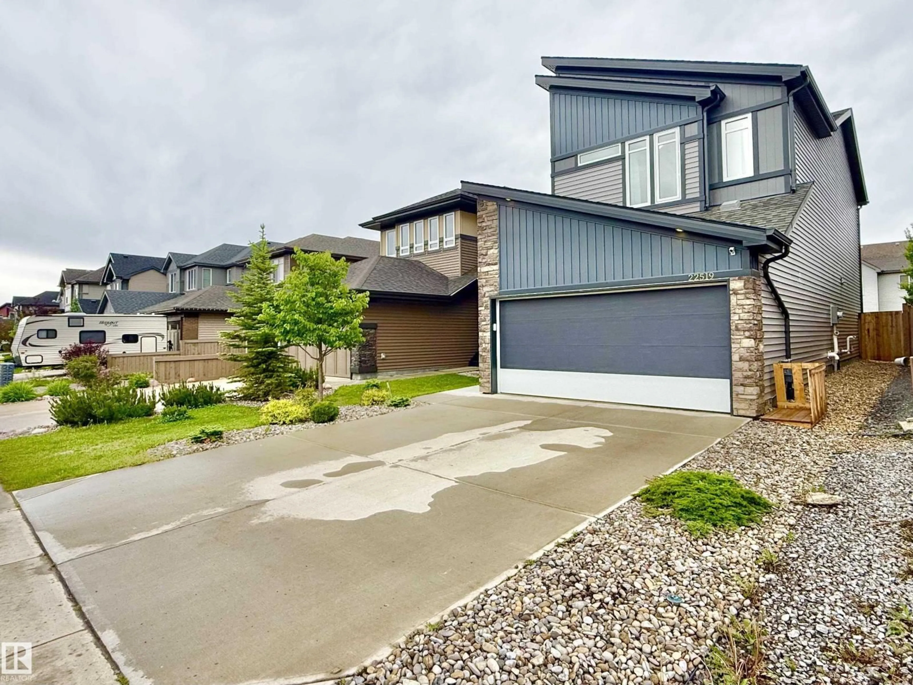 A pic from outside/outdoor area/front of a property/back of a property/a pic from drone, street for NW - 22519 96 AV, Edmonton Alberta T5T7K5